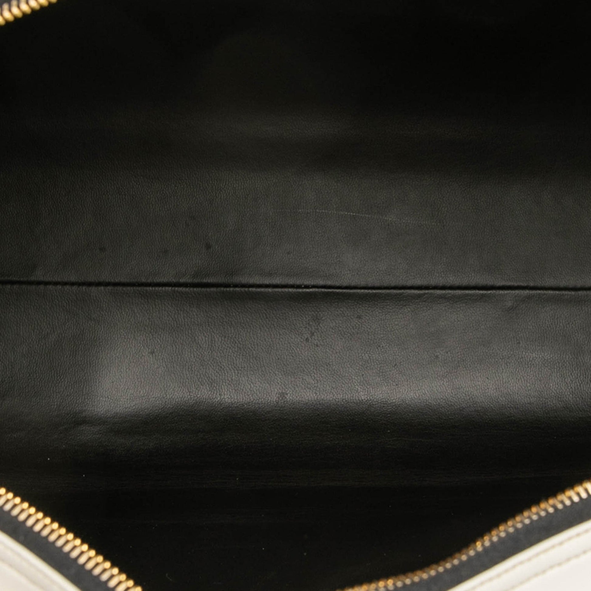Chanel Quilted Lambskin Grand Logo Duffle Bag