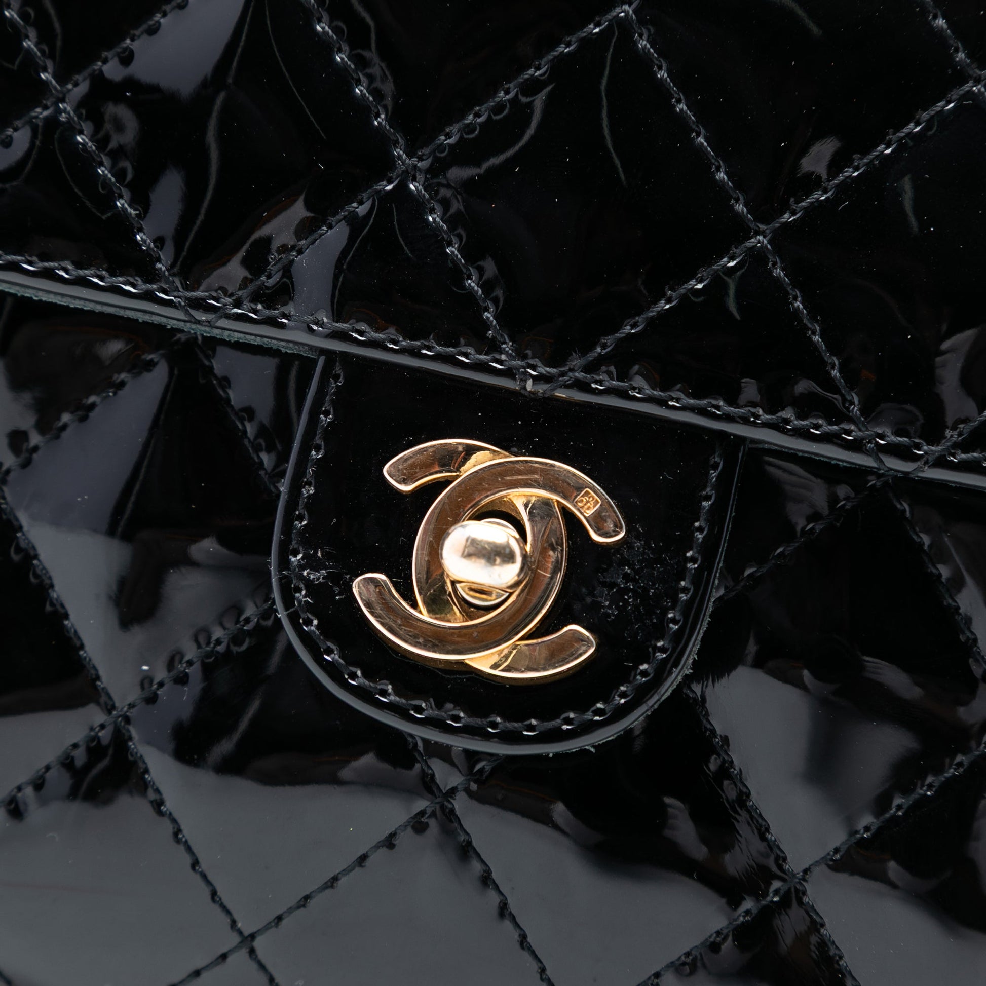 Chanel CC Quilted Patent Straight Single Flap