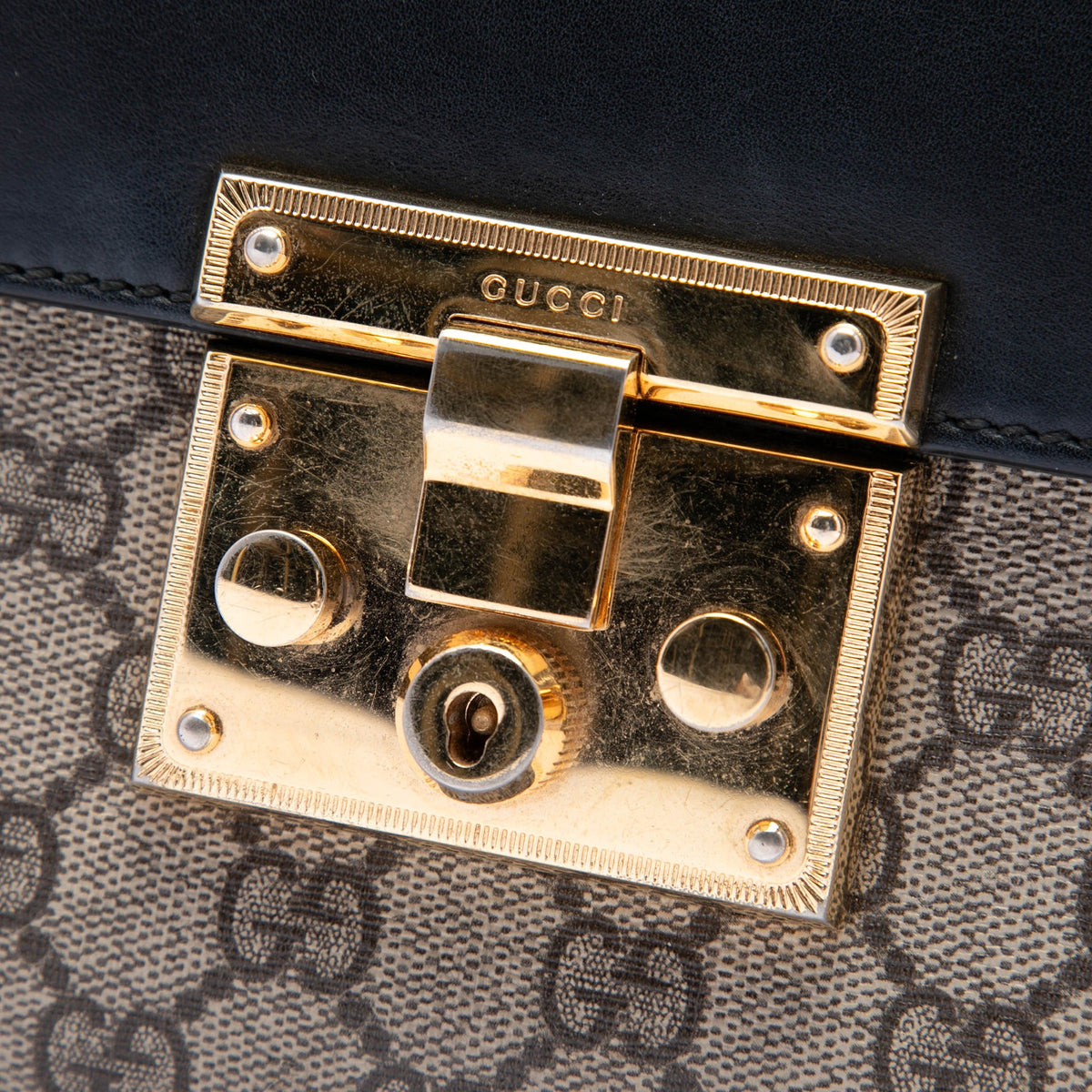 Gucci GG Supreme Padlock Clutch — Beige