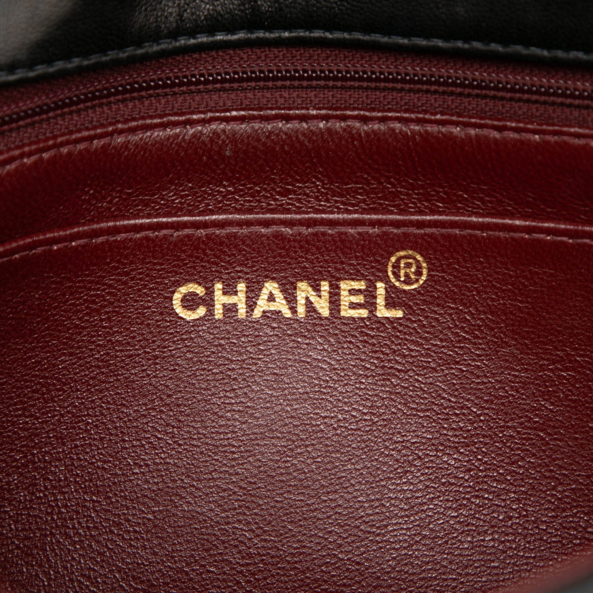 Chanel Medium Vertical Quilted Lambskin Mademoiselle Crossbody