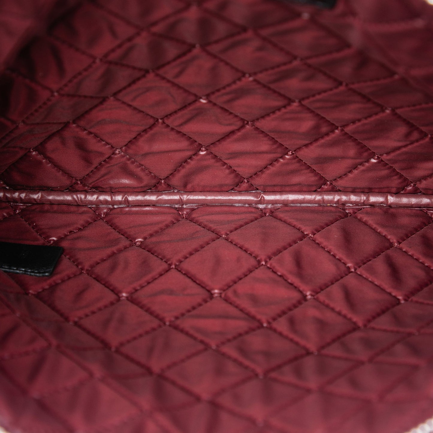 Chanel Medium Quilted Lambskin O Case Clutch