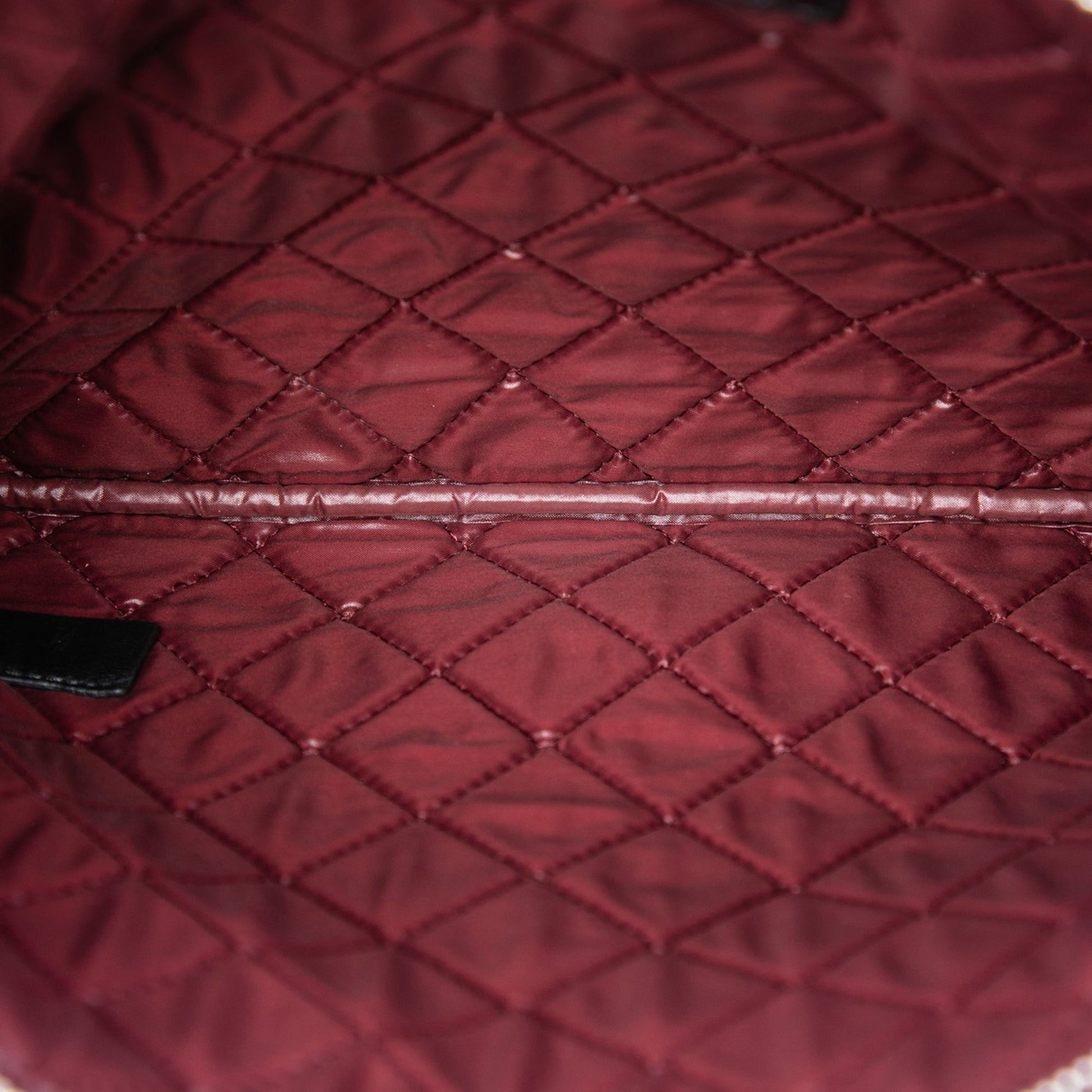 Chanel Medium Quilted Lambskin O Case Clutch