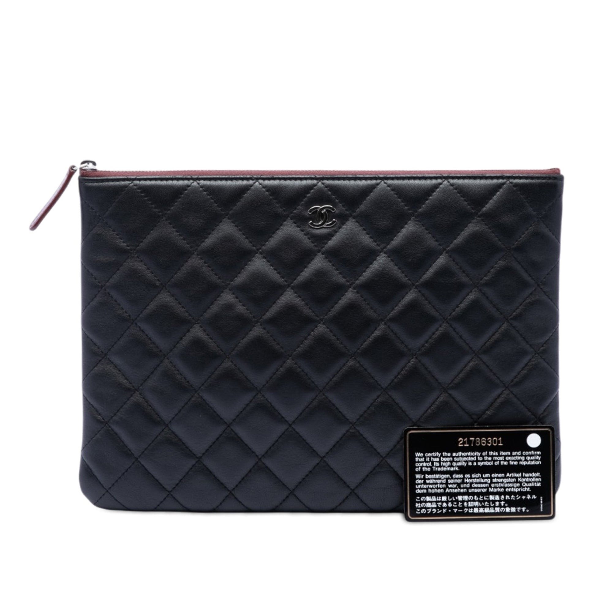 Chanel Medium Quilted Lambskin O Case Clutch