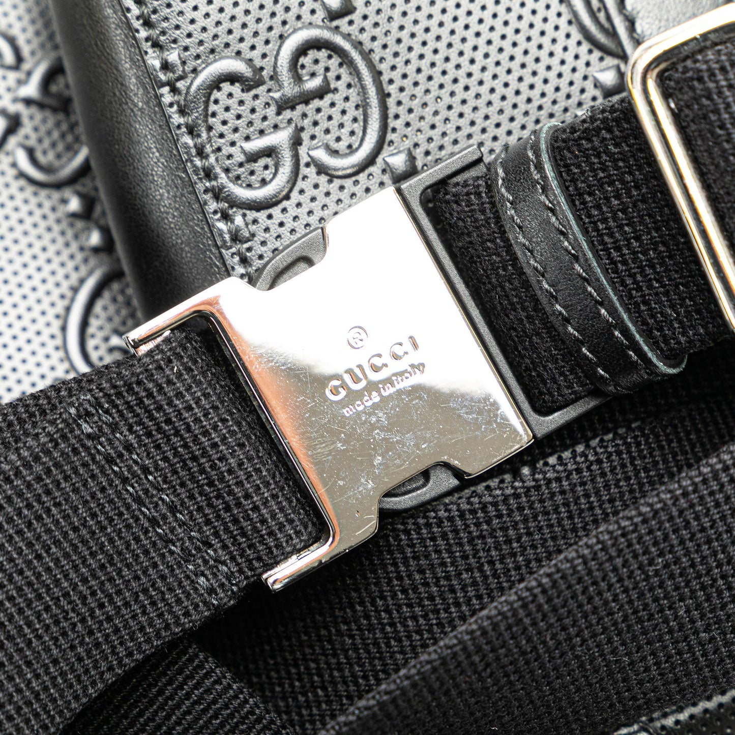 Gucci GG Embossed Perforated Double Belt Bag