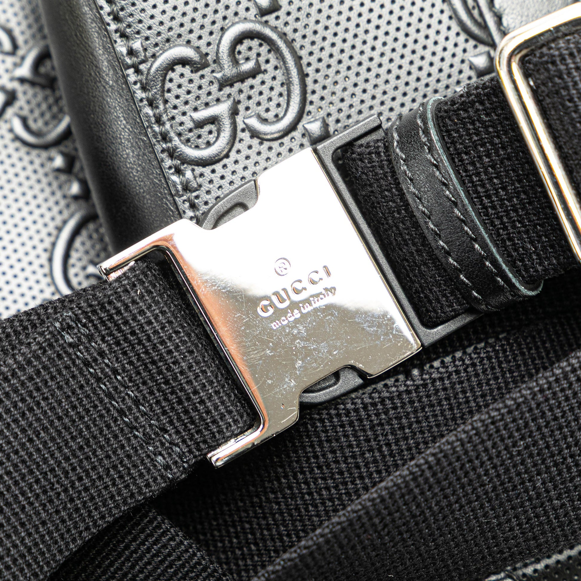 Gucci GG Embossed Perforated Double Belt Bag