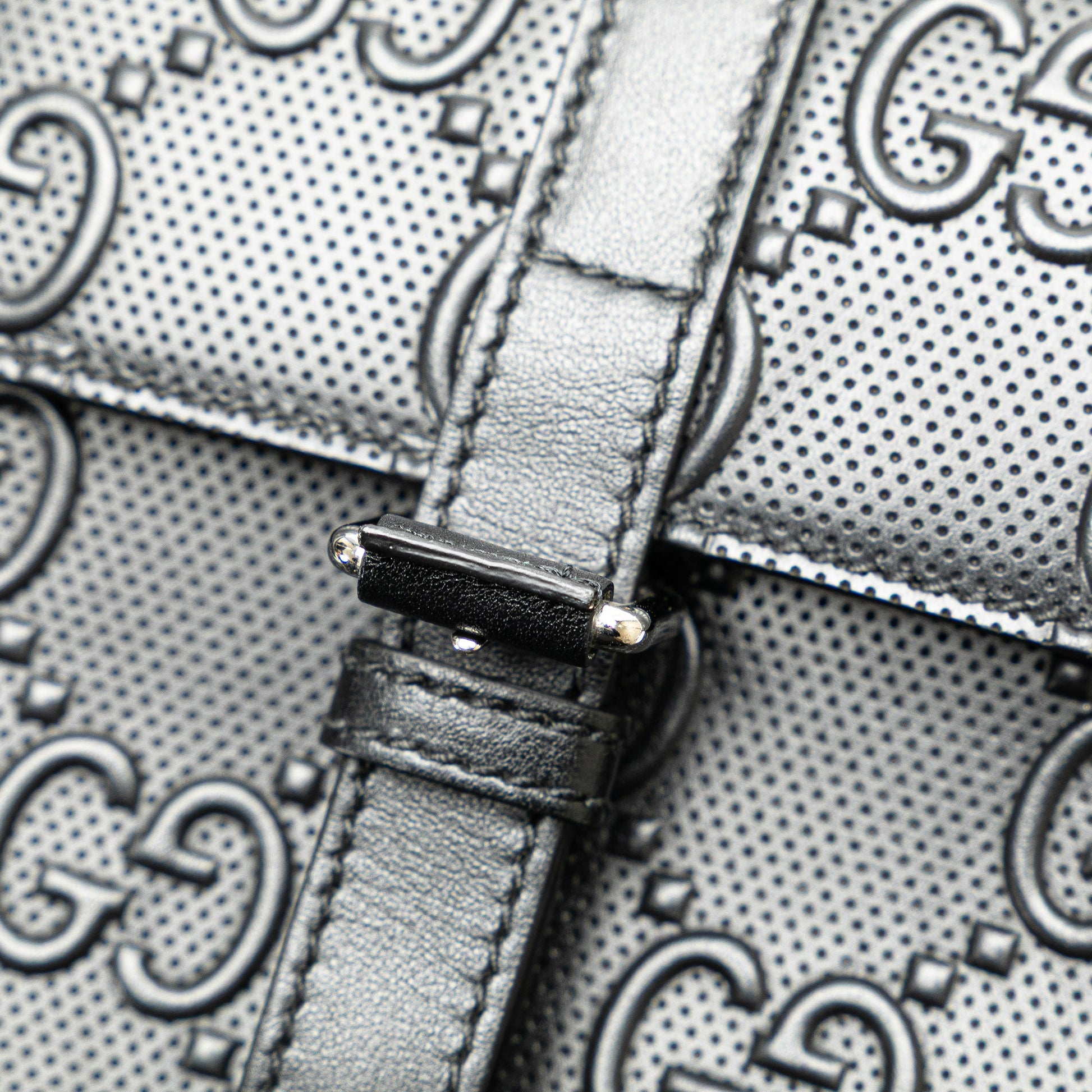 Gucci GG Embossed Perforated Double Belt Bag