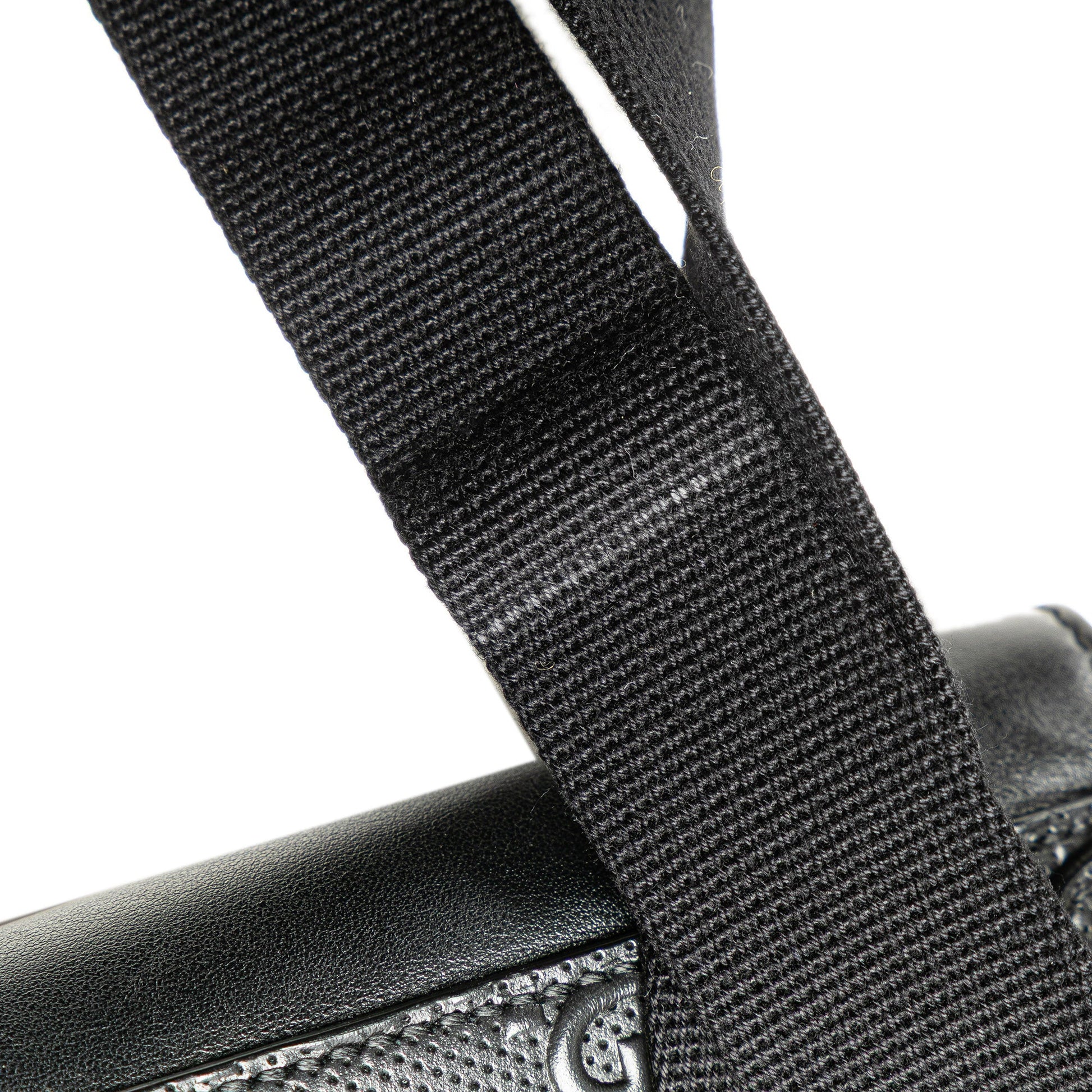 Gucci GG Embossed Perforated Double Belt Bag