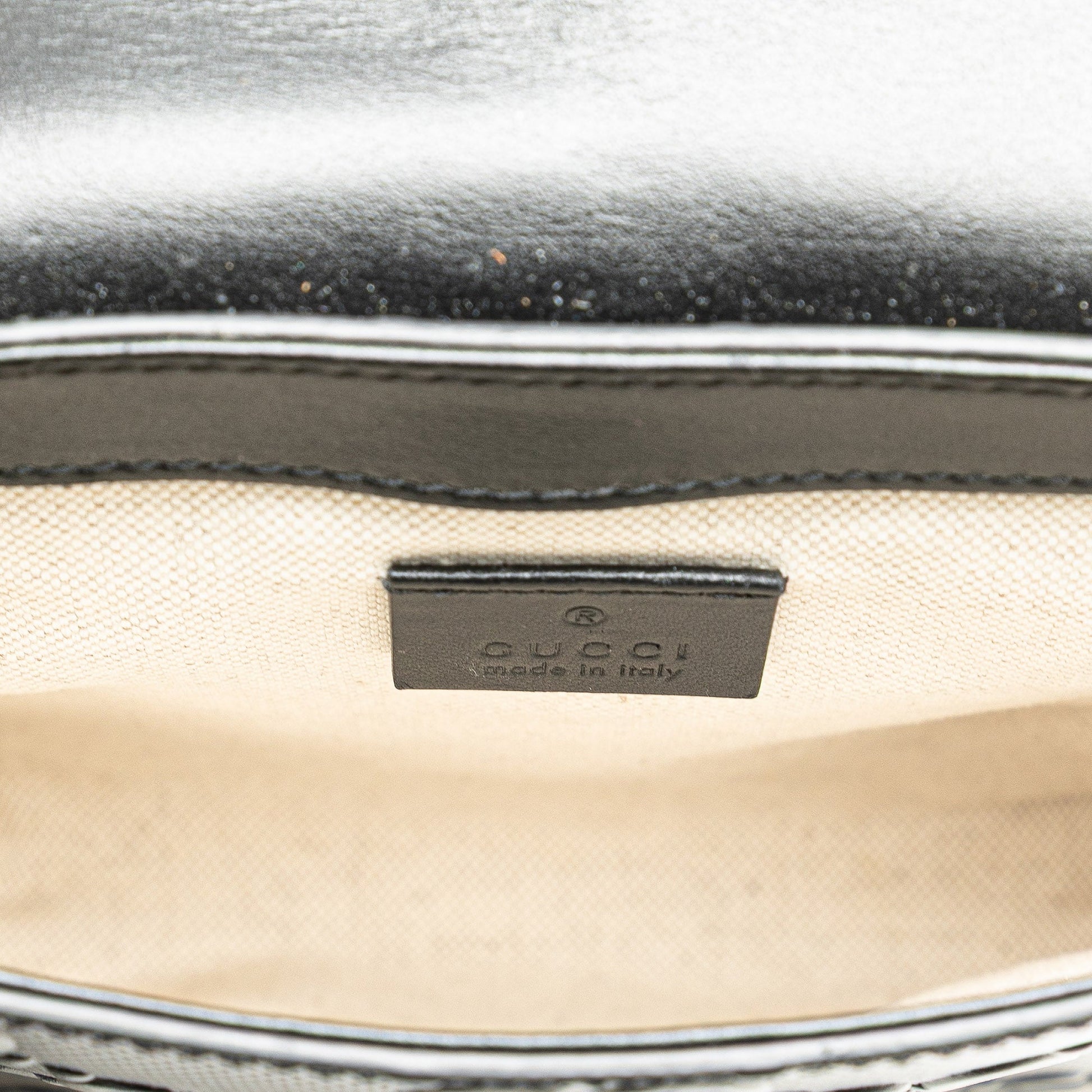 Gucci GG Embossed Perforated Double Belt Bag