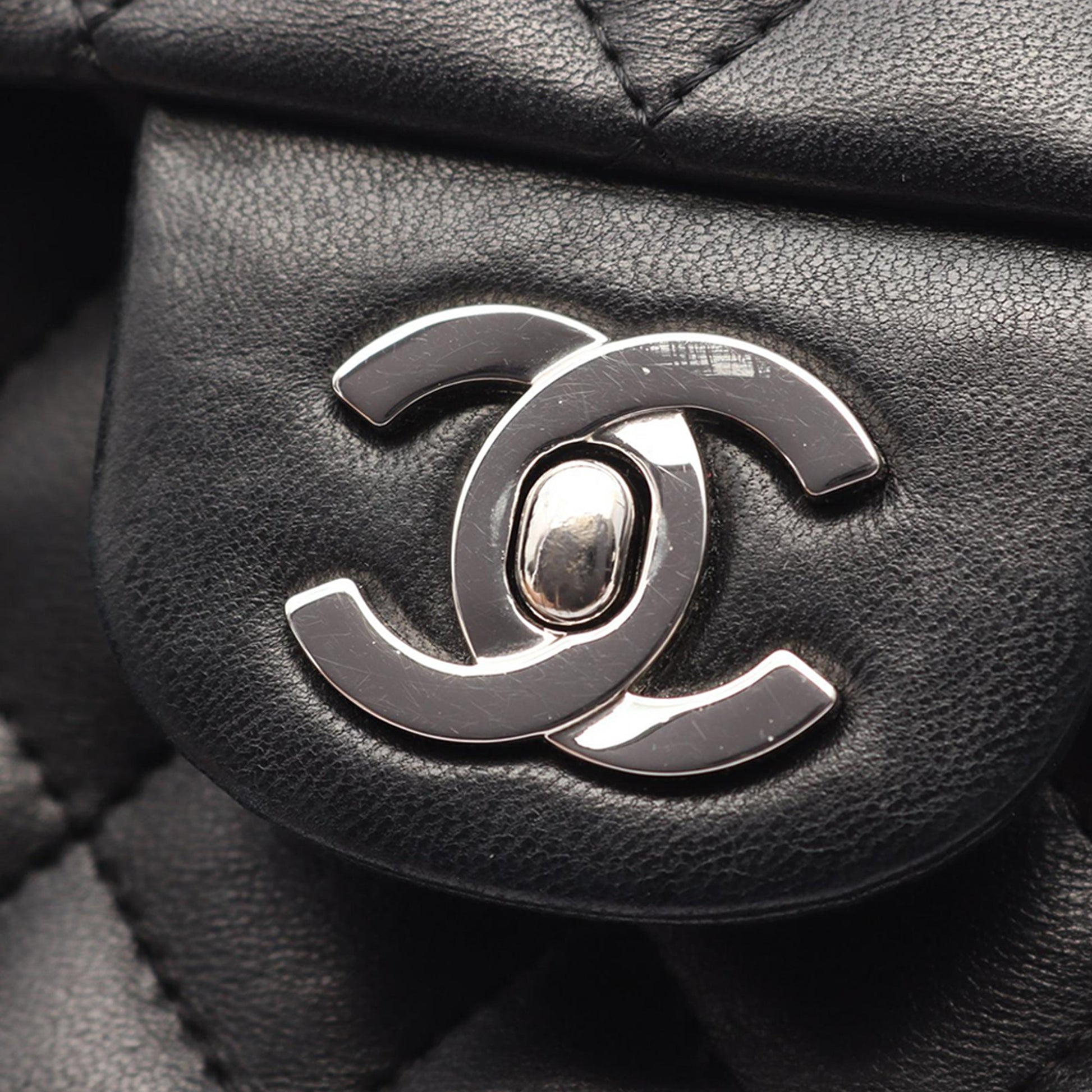 Chanel CC Quilted Lambskin East West Flap