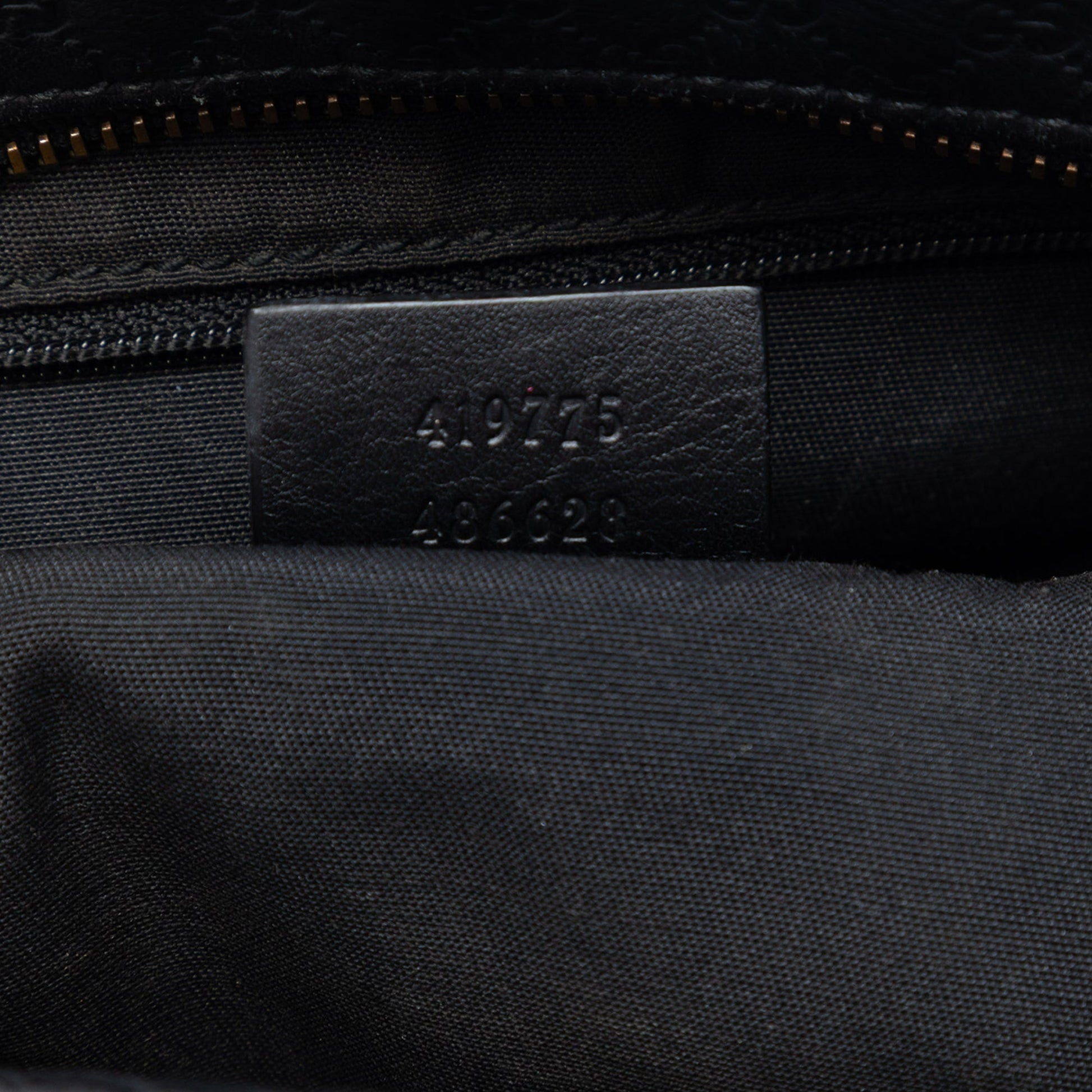 Gucci Microguccissima Clutch