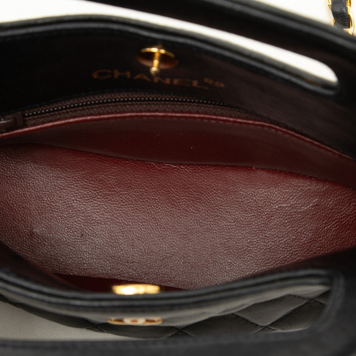 Chanel CC Quilted Lambskin Top Handle Round Frame Bag — Black
