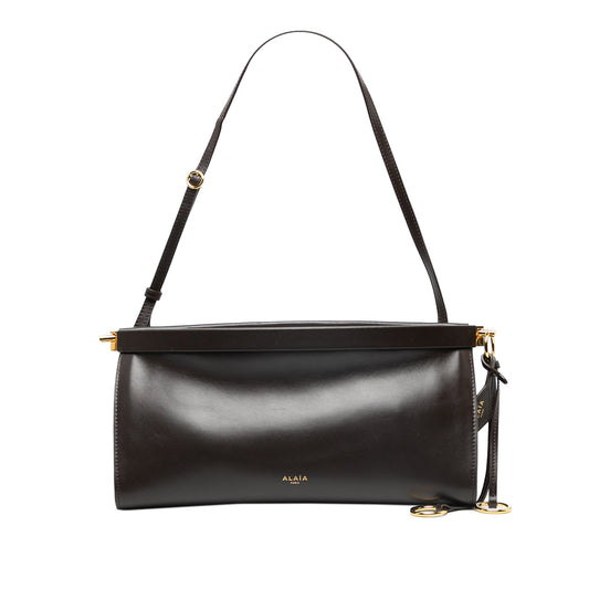 ALAÏA Medium Calfskin Le Click East West Shoulder Bag — Brown