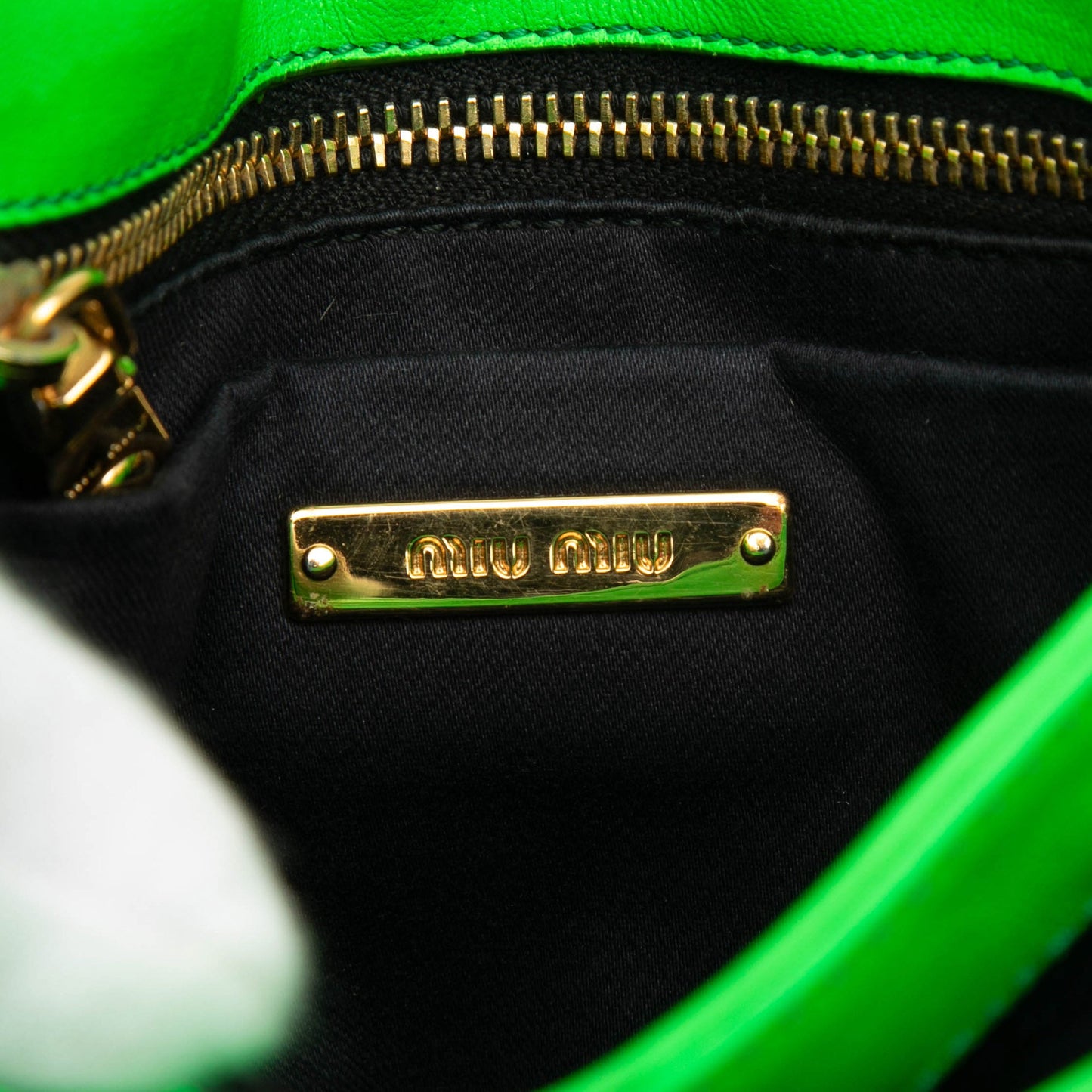 Miu Miu Leather Wing Strap Crossbody