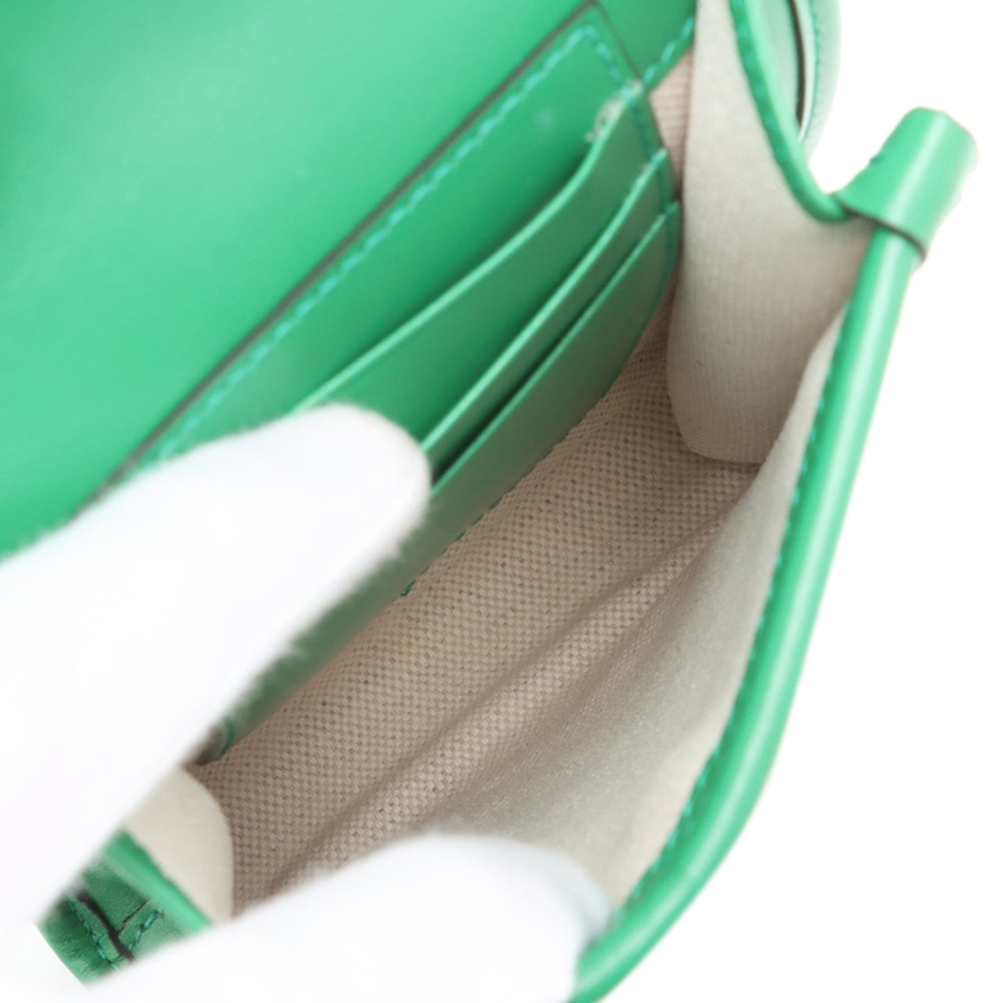 Gucci GG Embossed Flap Crossbody