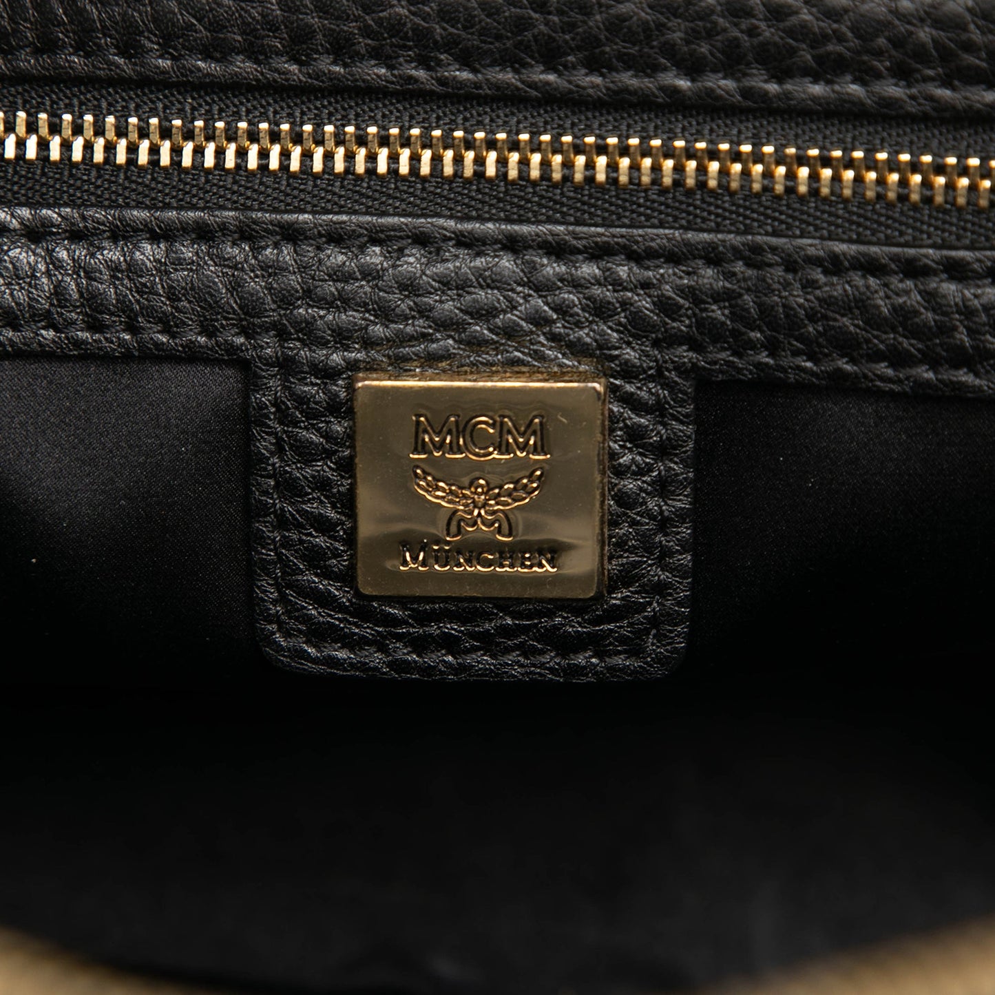 MCM Mini Studded Leather Stark Backpack