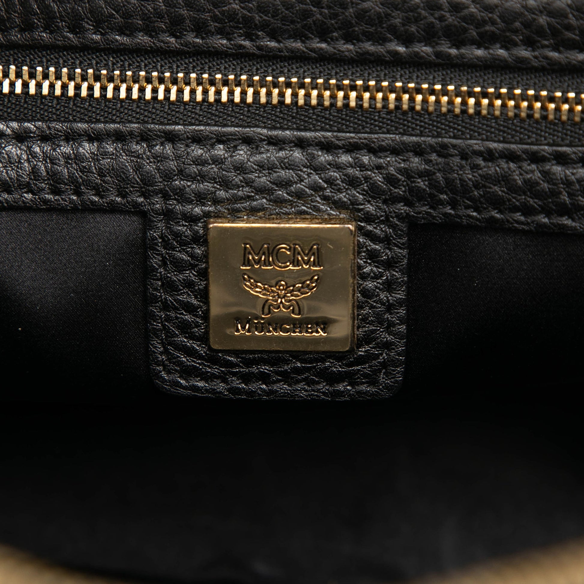 MCM Mini Studded Leather Stark Backpack