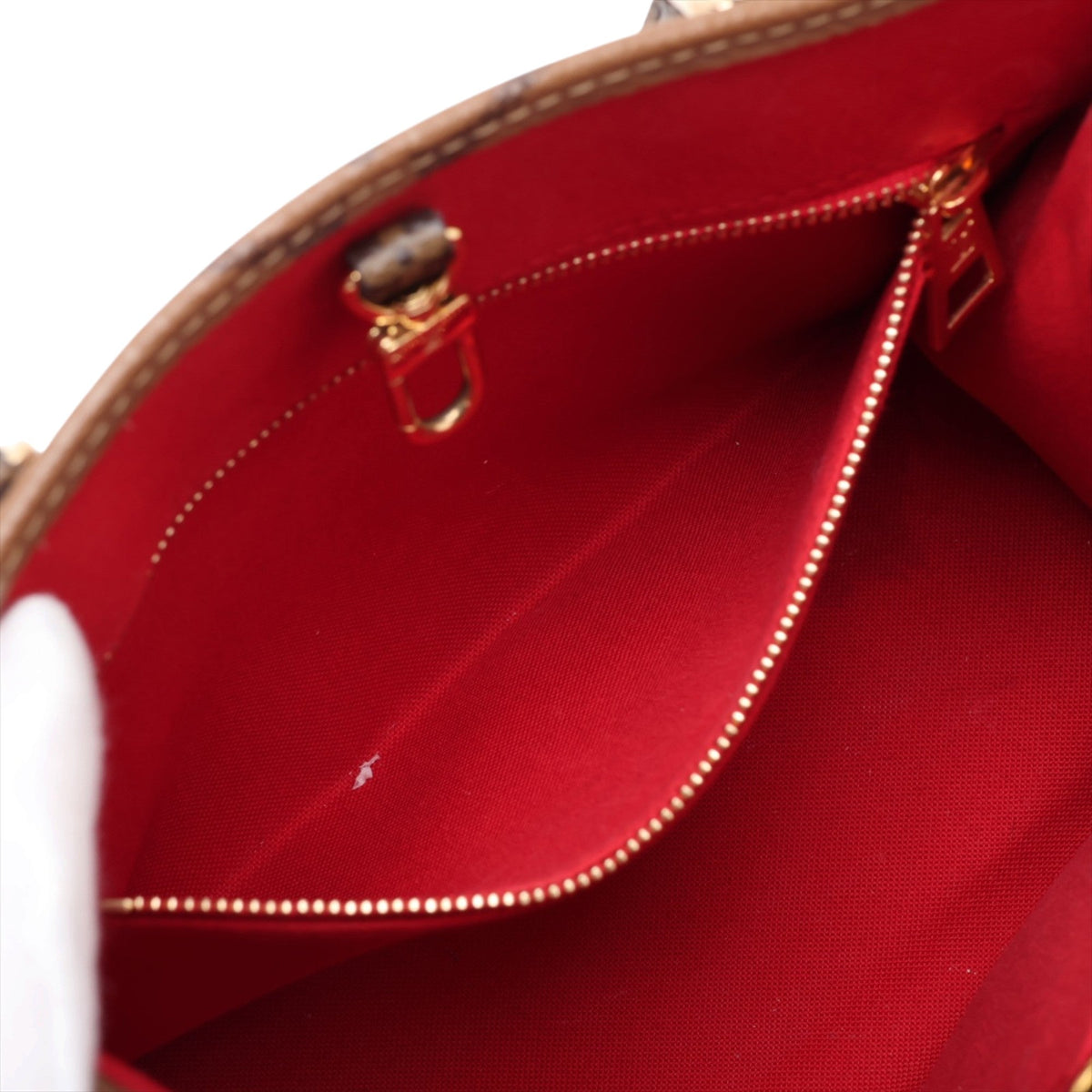 Louis Vuitton Monogram Reverse Giant OnTheGo PM — Brown