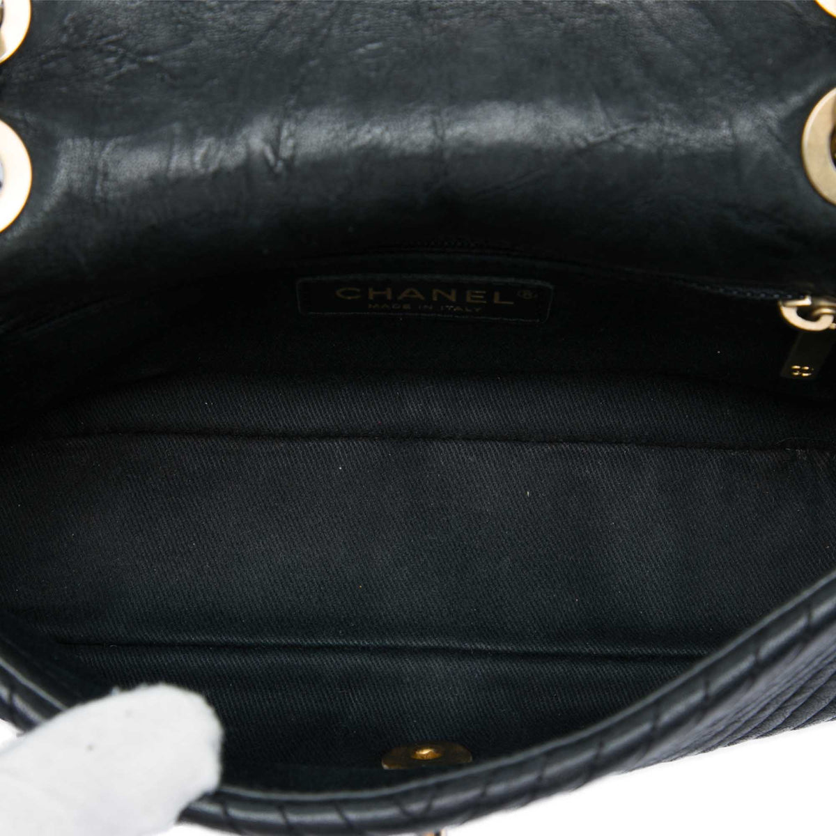 Chanel Small Chevron Wrinkled Calfskin Medallion Charm Surpique Flap