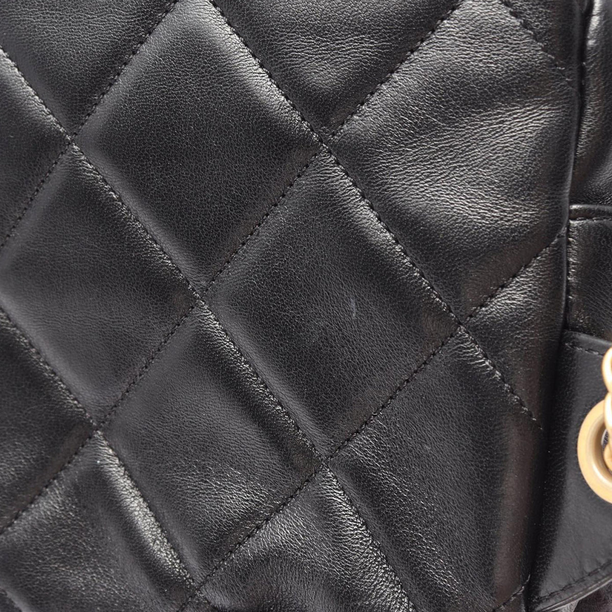 Chanel CC Quilted Lambskin Chain Melody Backpack