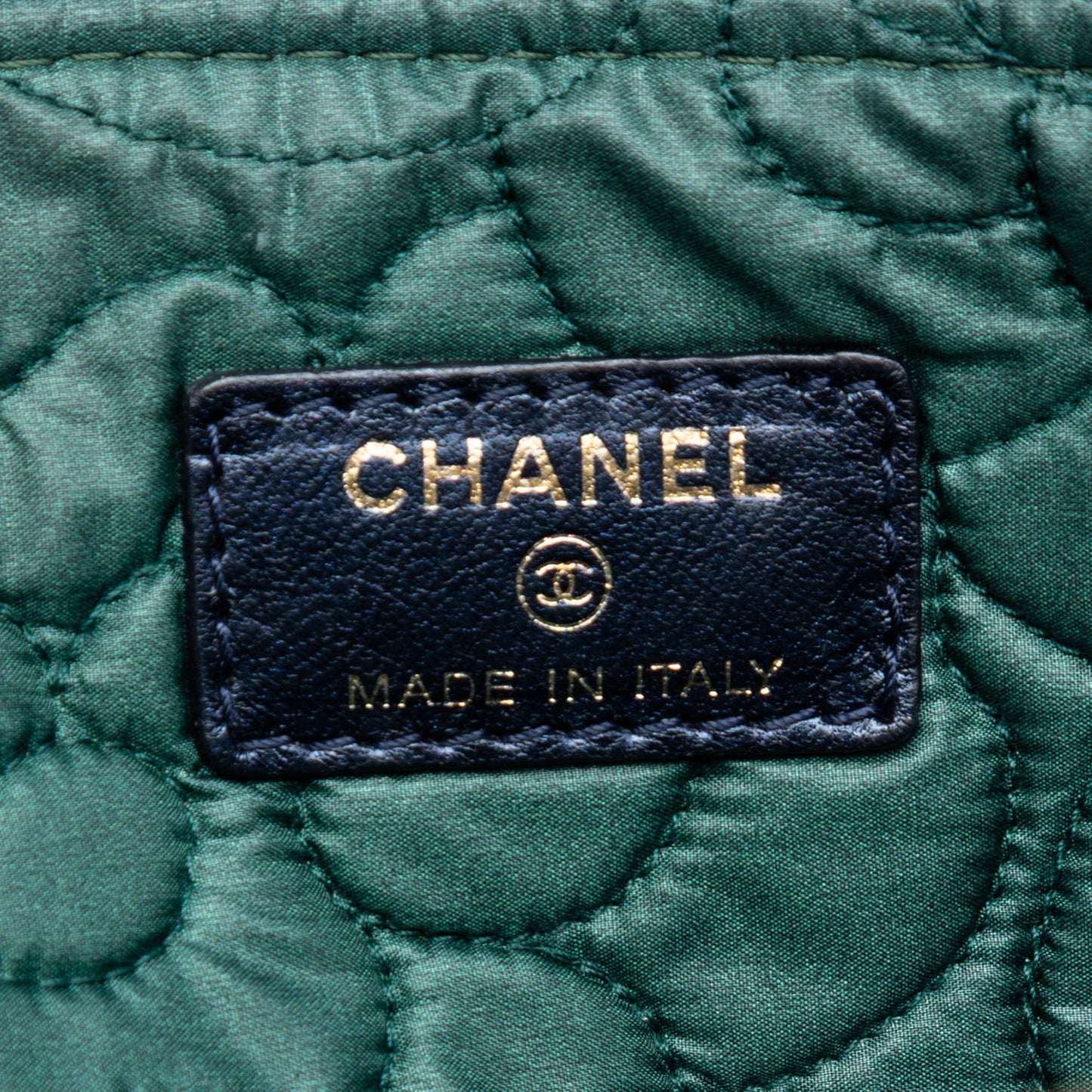 Chanel Large Embossed Lambskin Camellia O Case Clutch