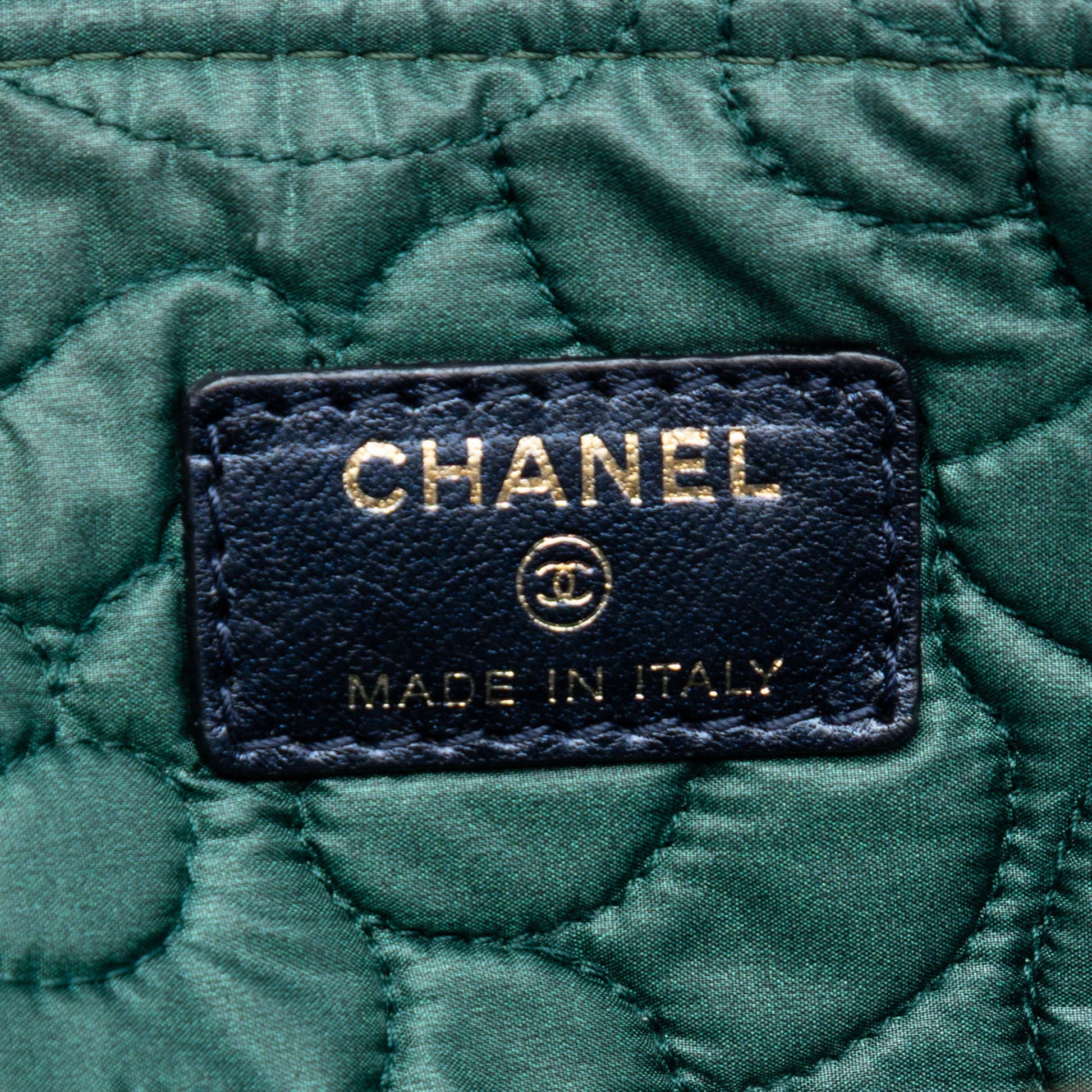 Chanel Large Embossed Lambskin Camellia O Case Clutch