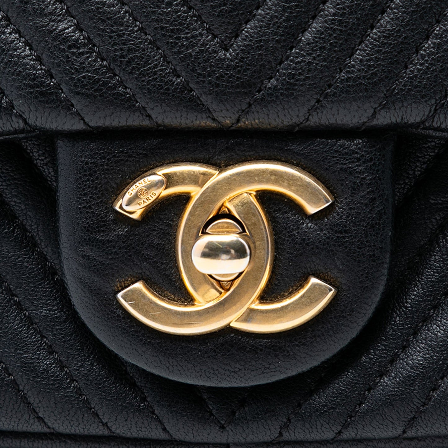 Small Chevron Wrinkled Calfskin Medallion Charm Surpique Flap