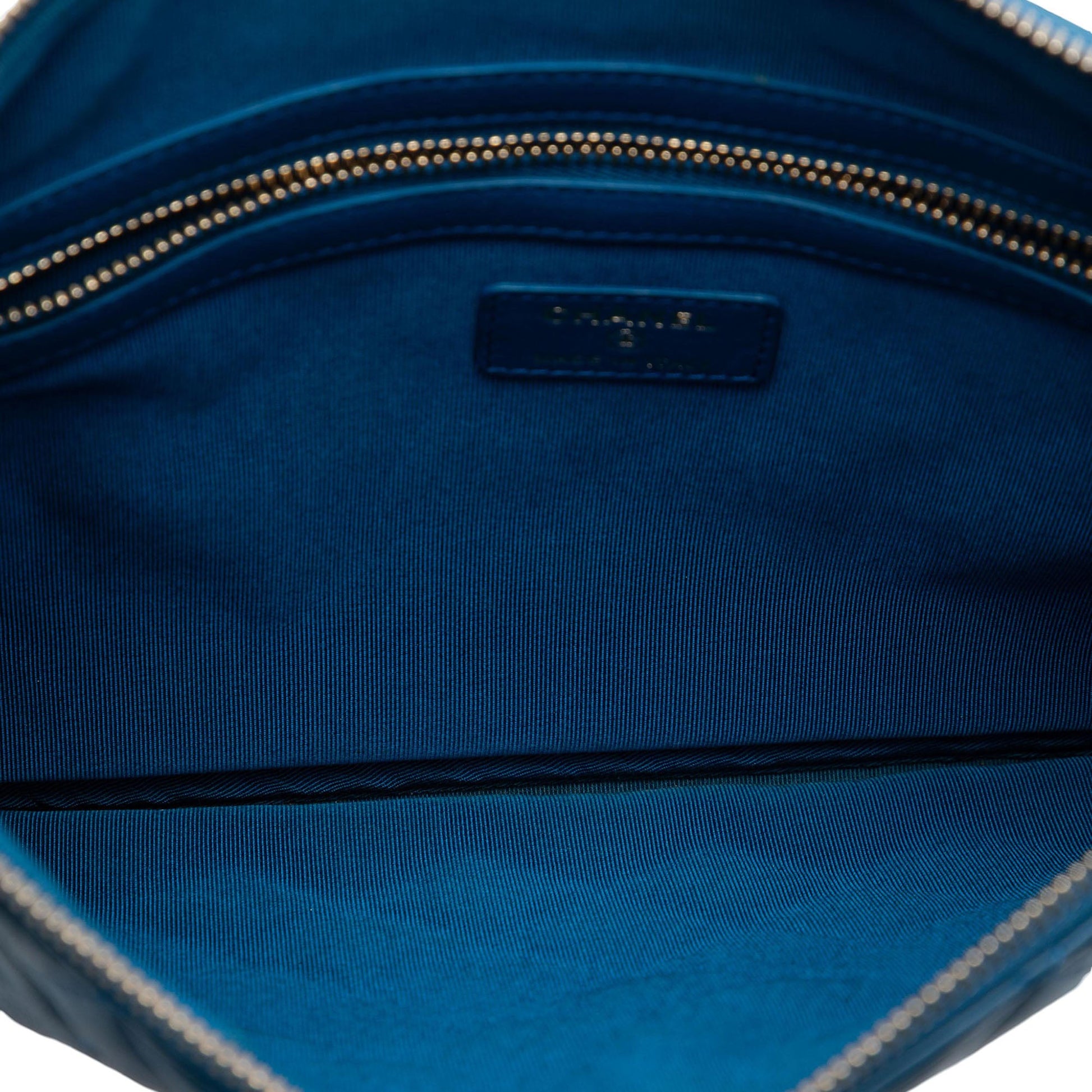 Chanel Medium Quilted Lambskin O Case Clutch