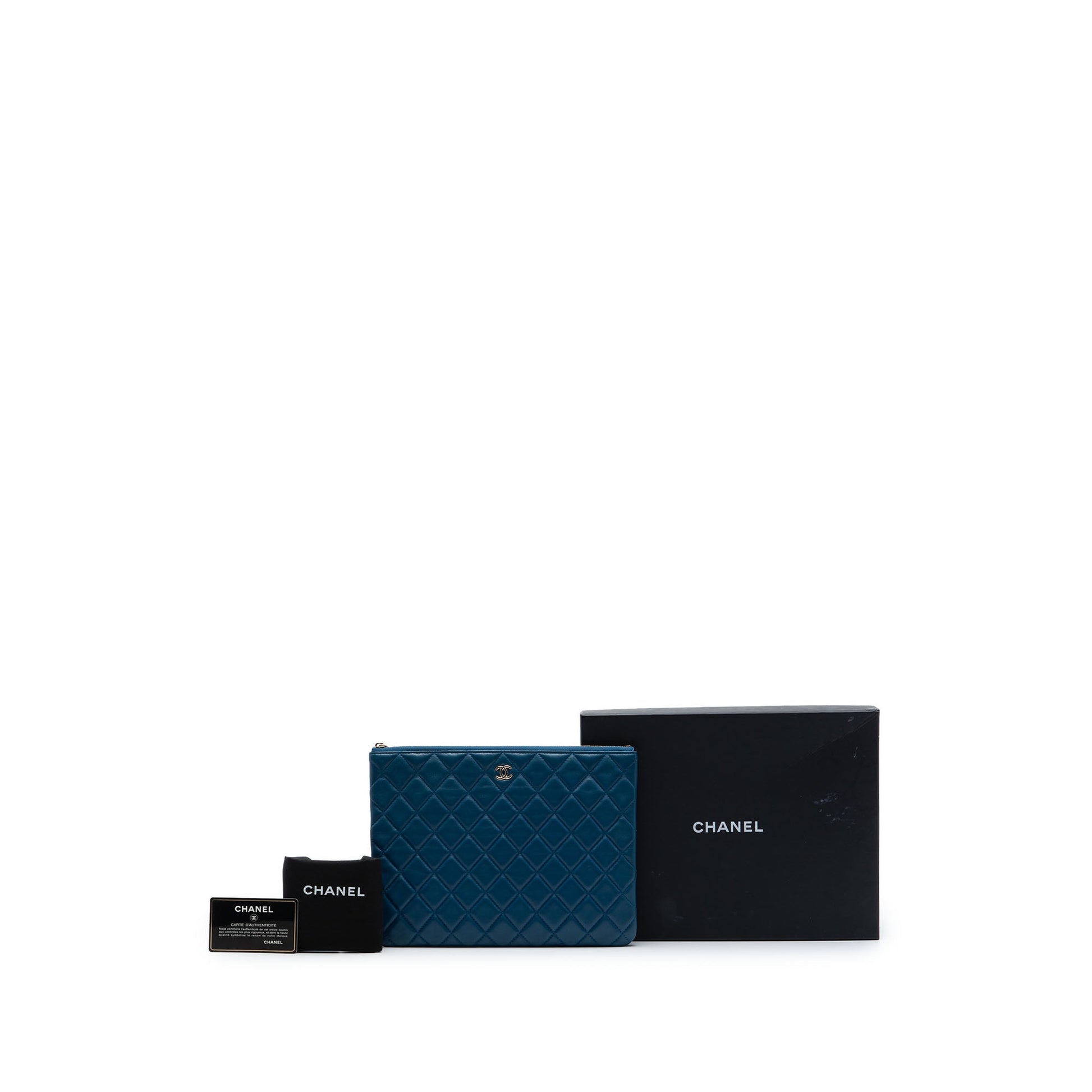 Chanel Medium Quilted Lambskin O Case Clutch