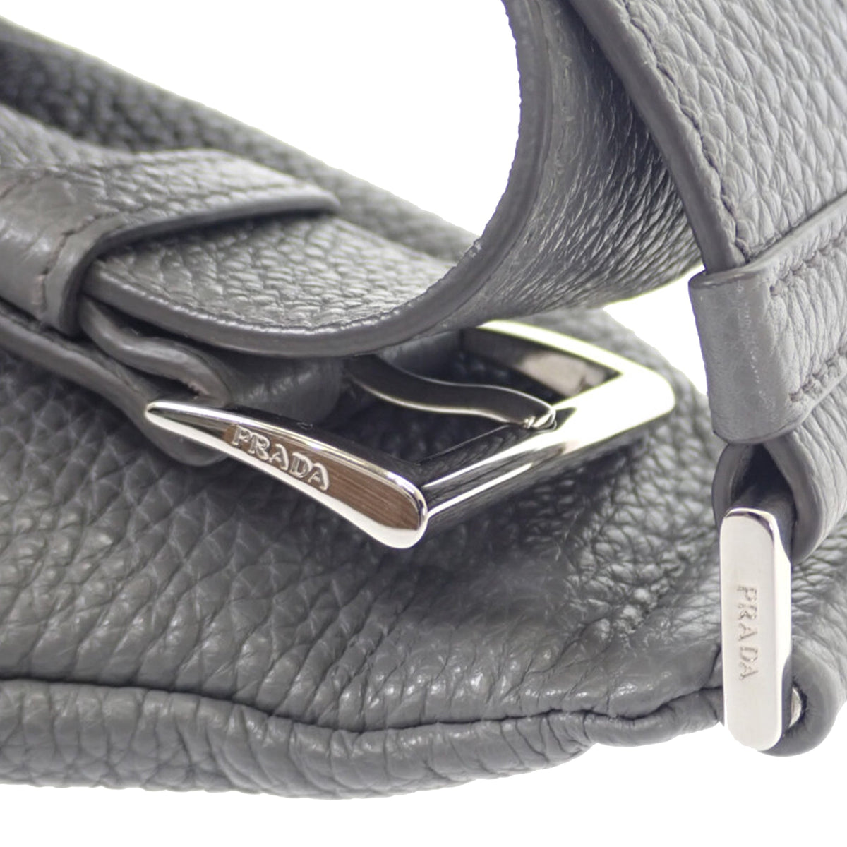 Prada Vitello Daino Logo Embossed Sling Bag