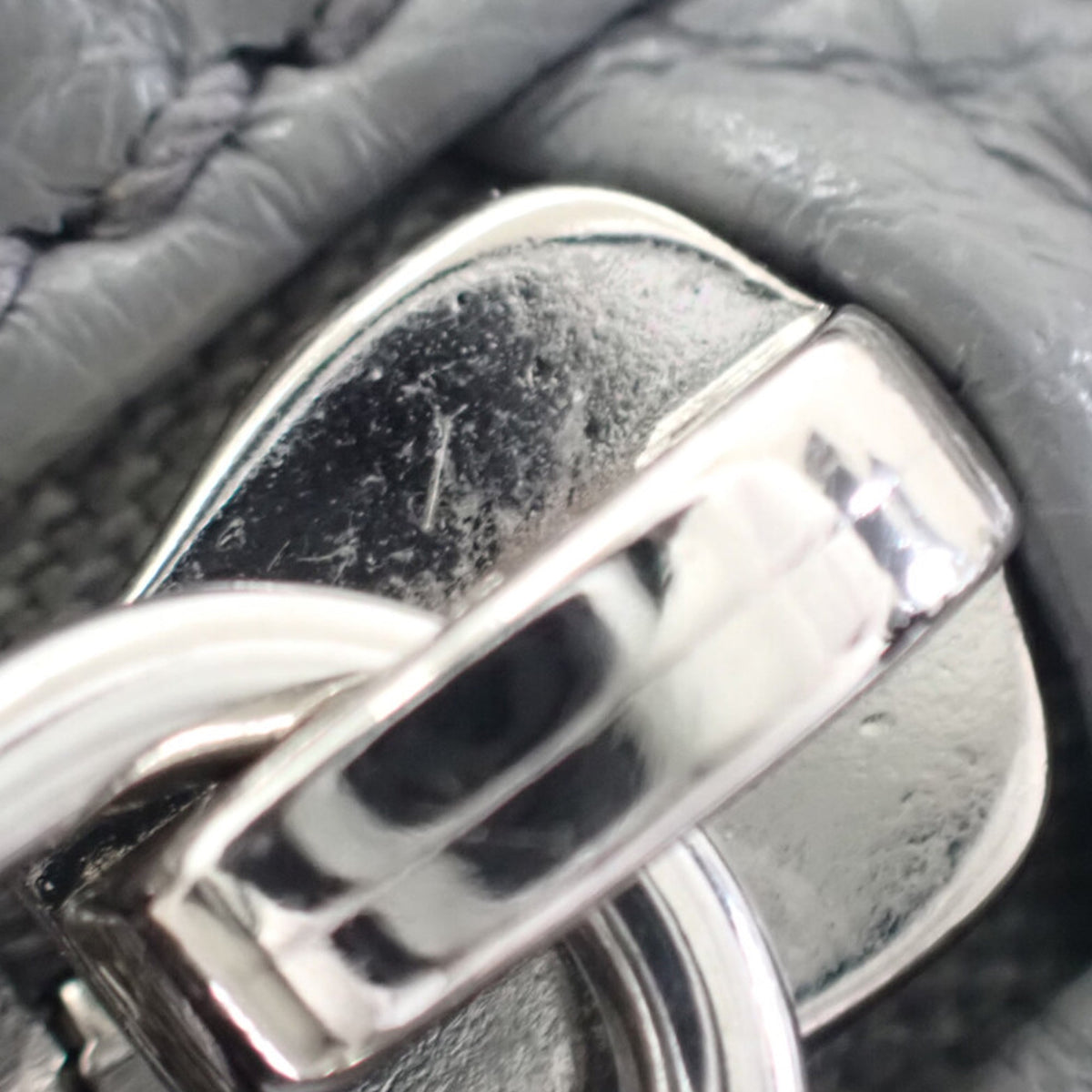 Prada Vitello Daino Logo Embossed Sling Bag