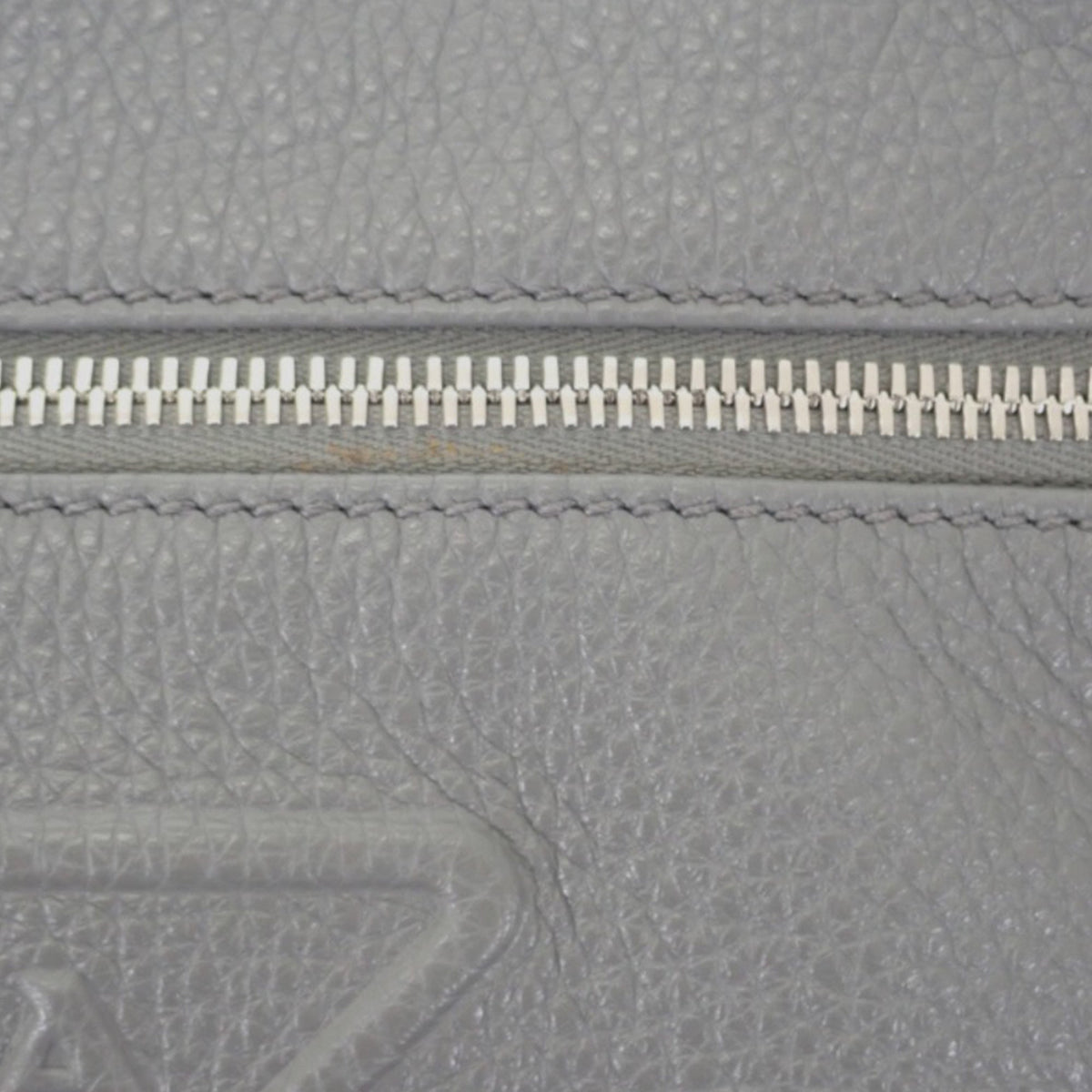 Prada Vitello Daino Logo Embossed Sling Bag