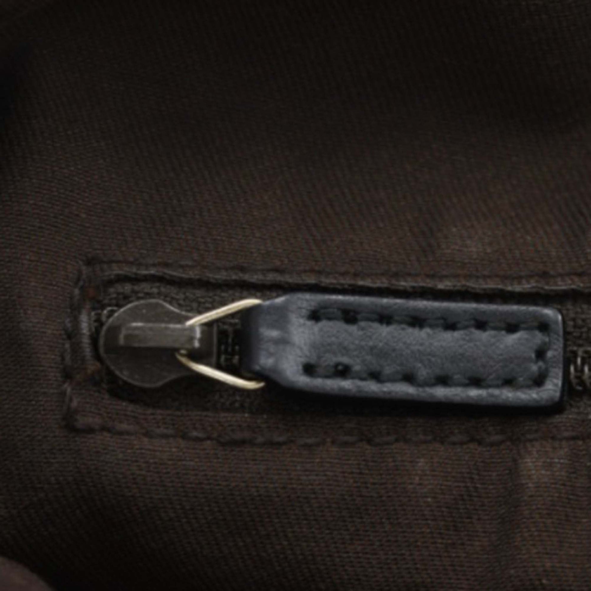 Gucci GG Canvas Sukey Satchel