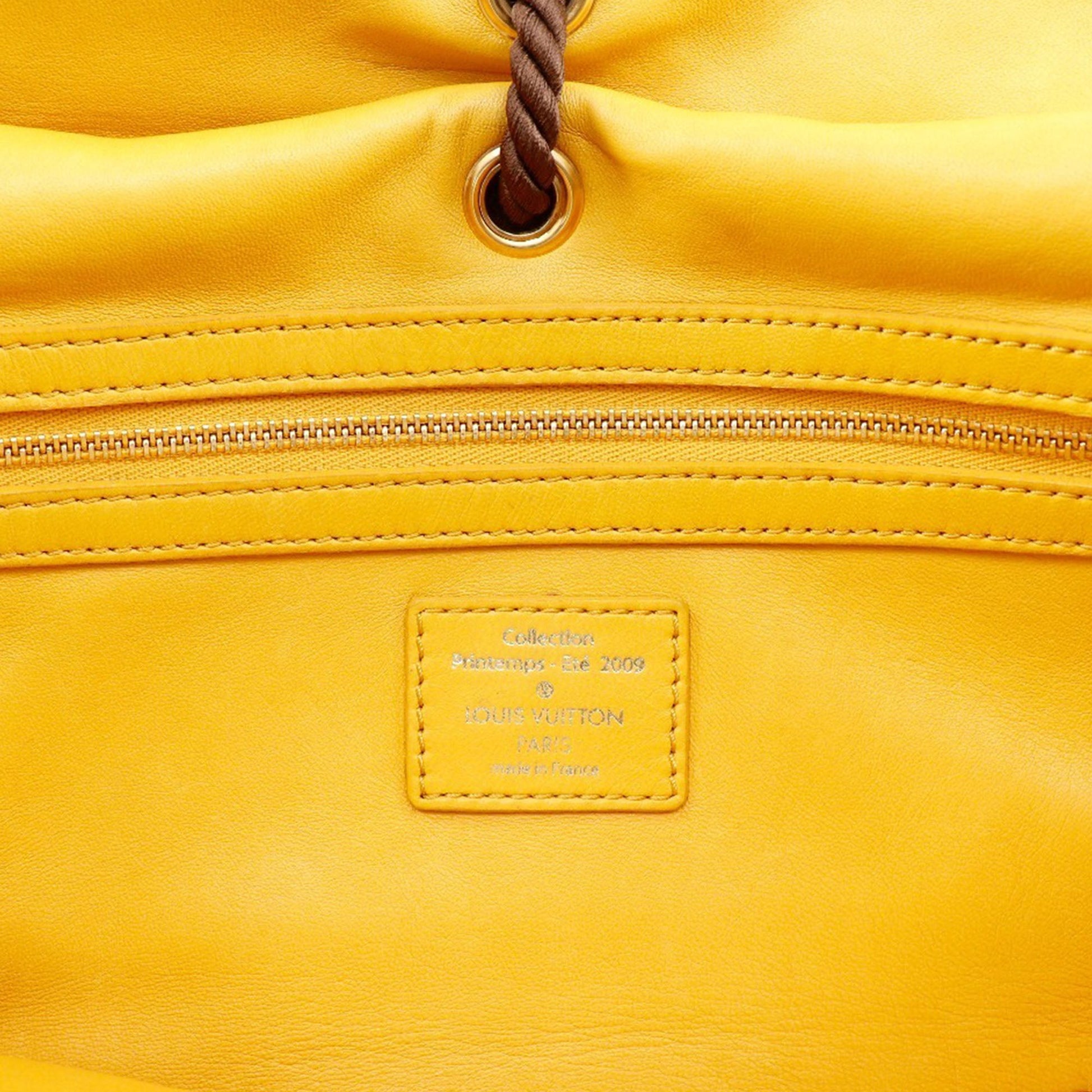 Monogram Metisse African Queen Clutch