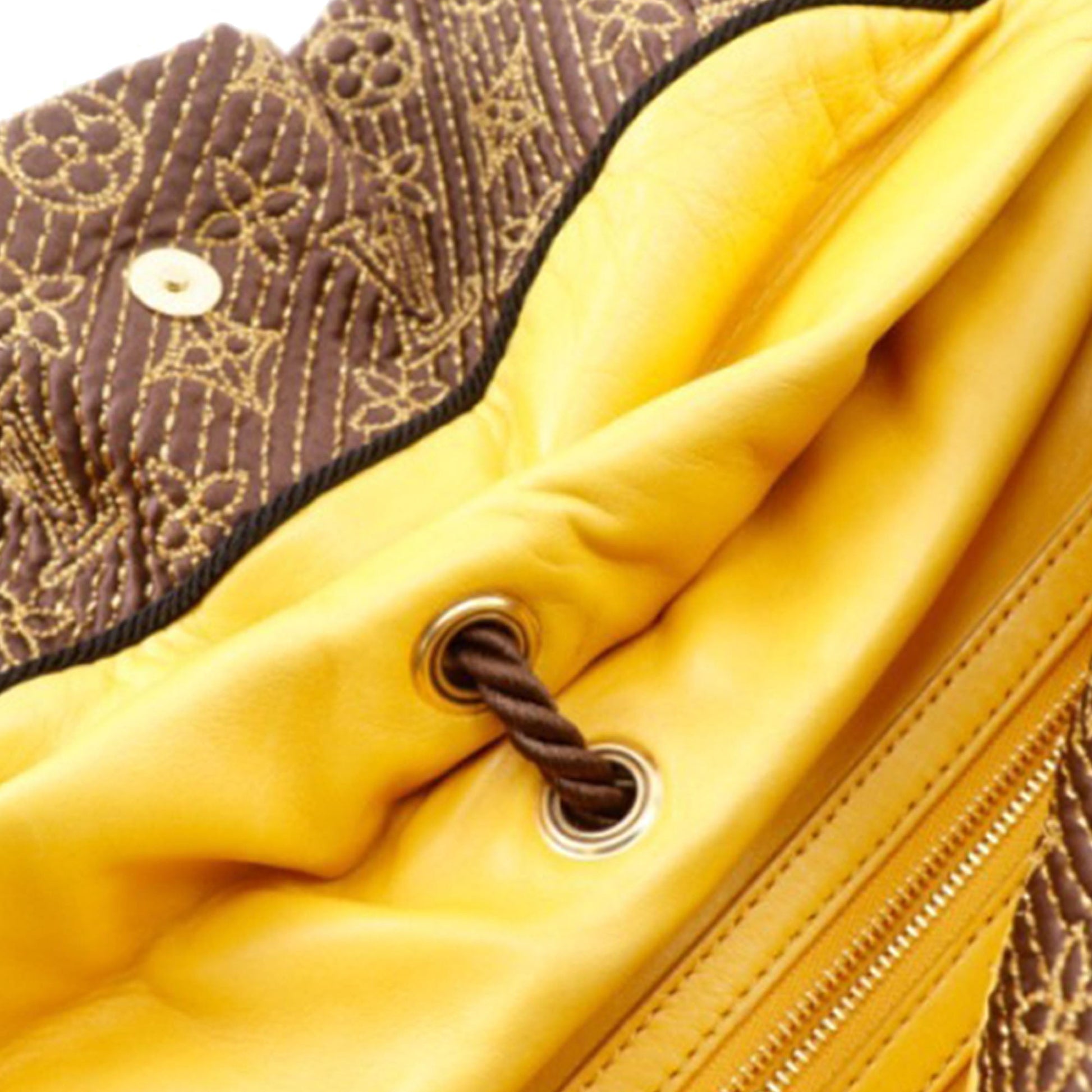 Monogram Metisse African Queen Clutch