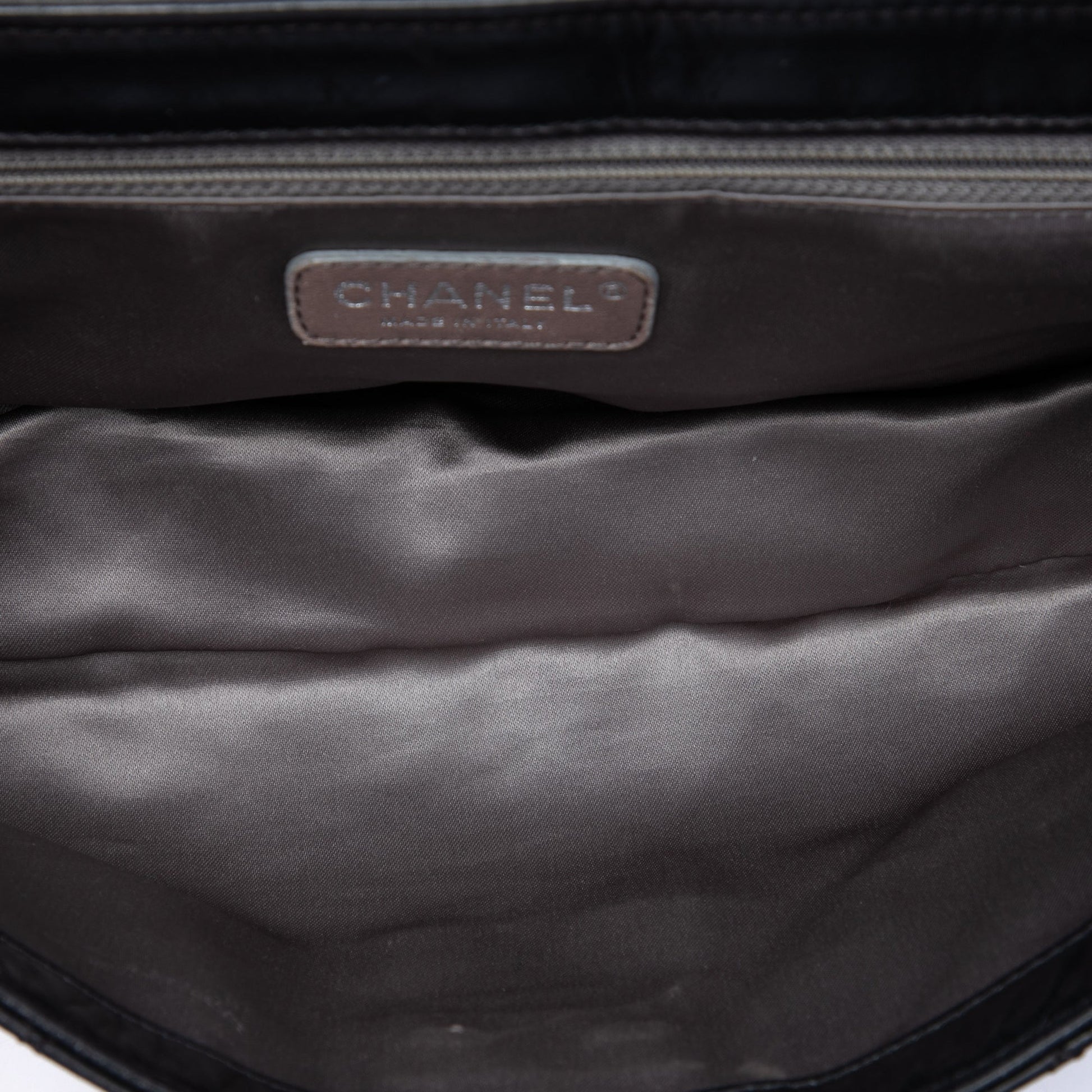 Chanel Quilted Lambskin East West Mademoiselle Flap