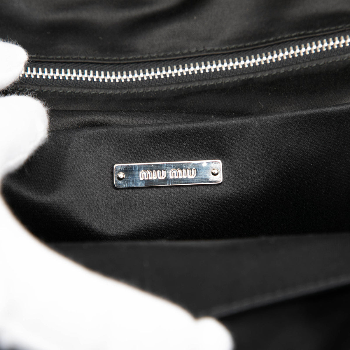 Miu Miu Leather Trimmed Crystal Embellished Matelasse Nylon Backpack — Brown