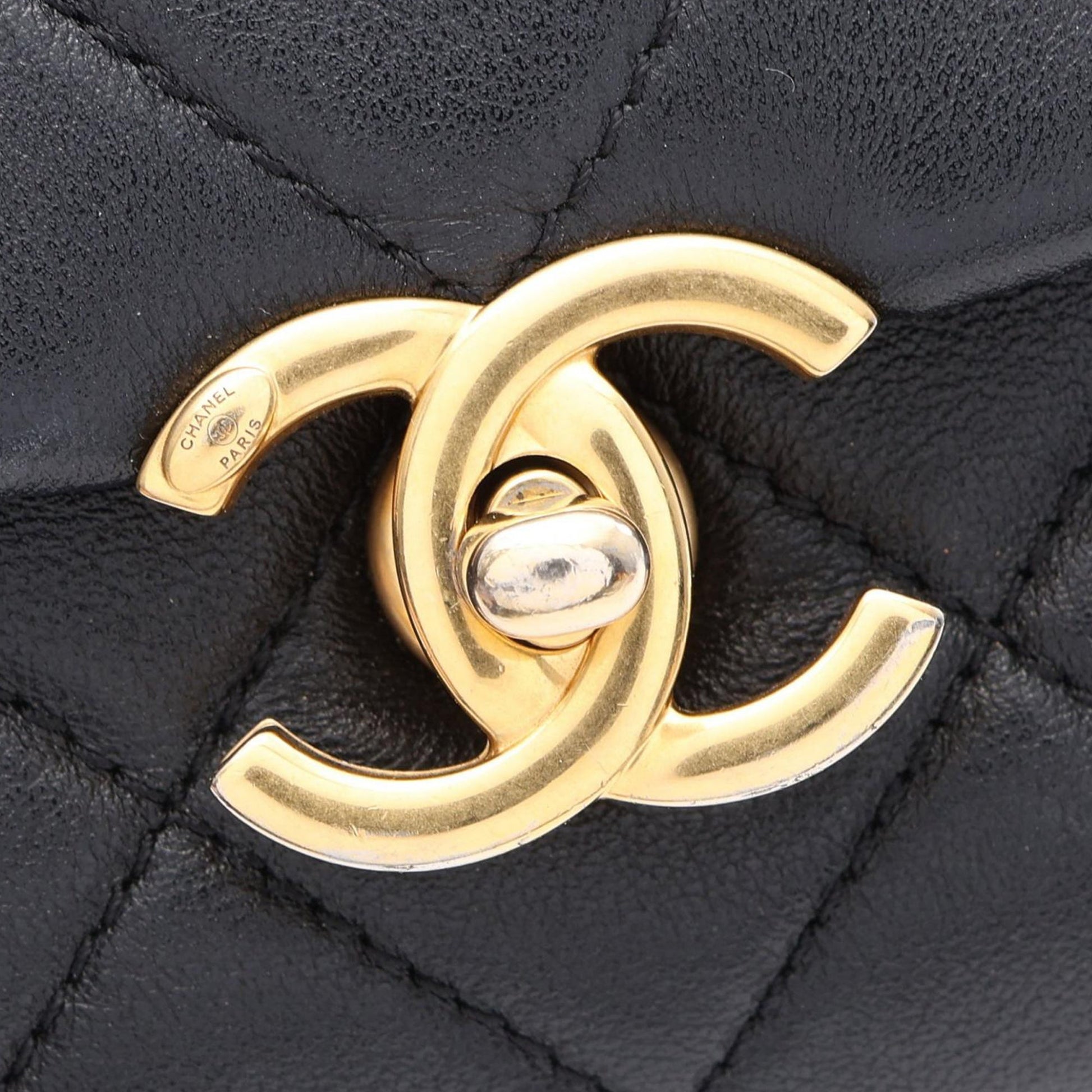 Chanel CC Quilted Lambskin Buckle Flap