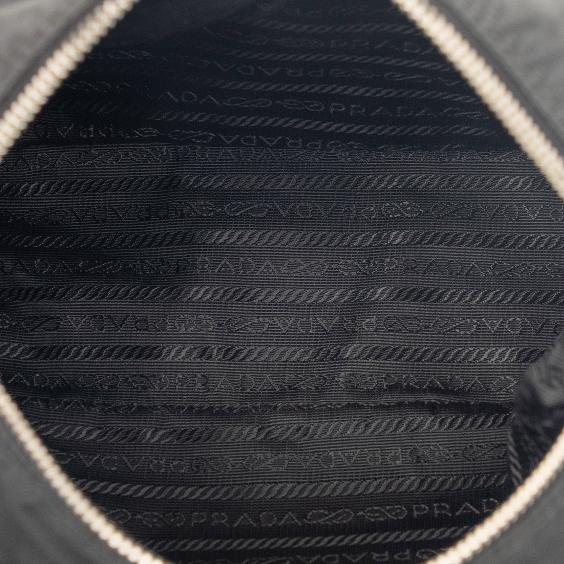 Tessuto Zip Buckle Messenger Bag