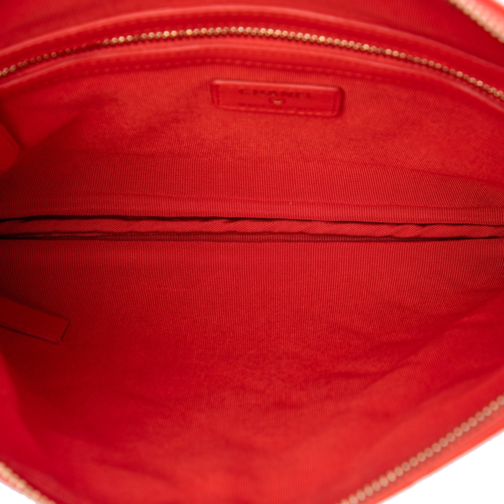 Chanel Medium Quilted Lambskin O Case Clutch