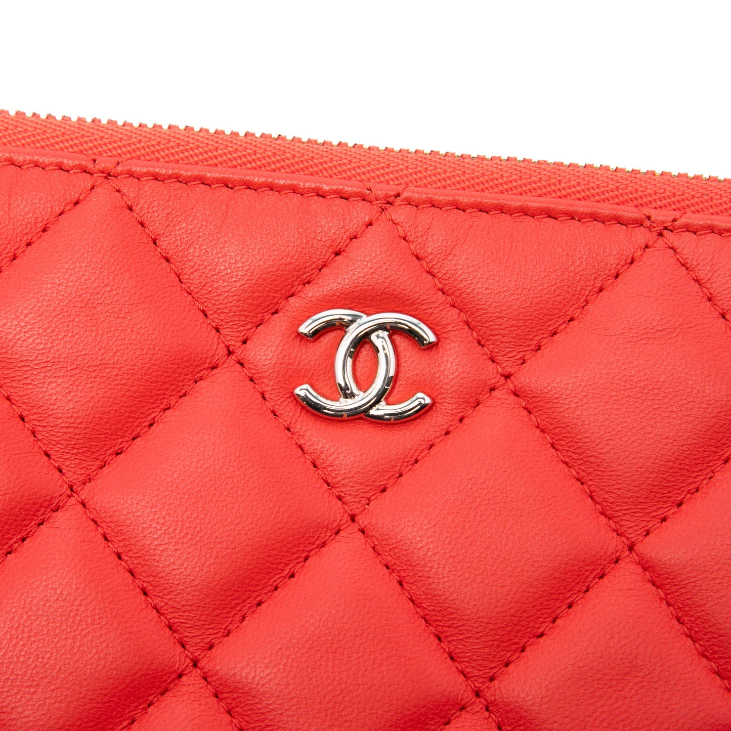 Chanel Medium Quilted Lambskin O Case Clutch