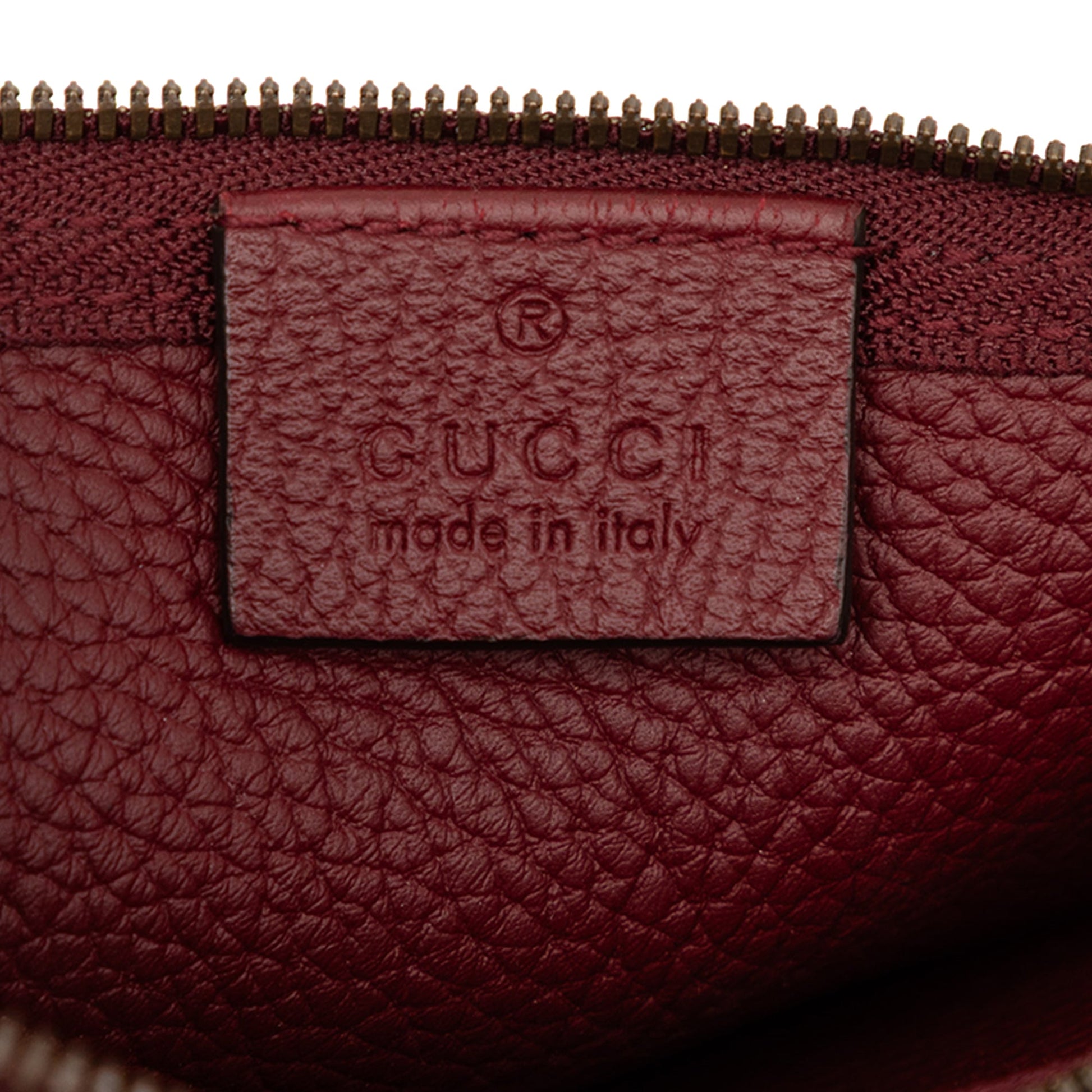 Gucci Grained Leather Vertical Zip Sling Bag