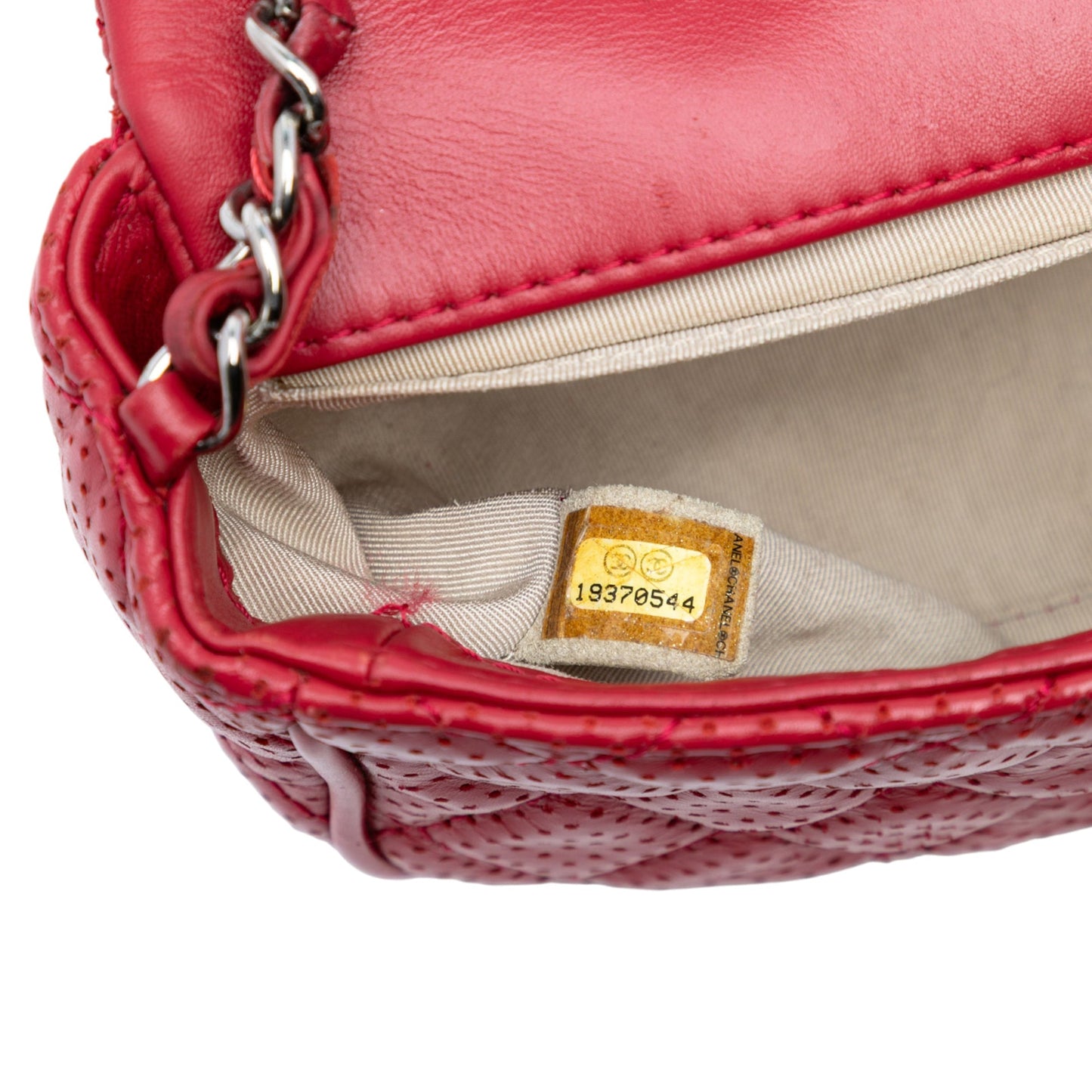 Chanel Mini Perforated Lambskin Punch Flap