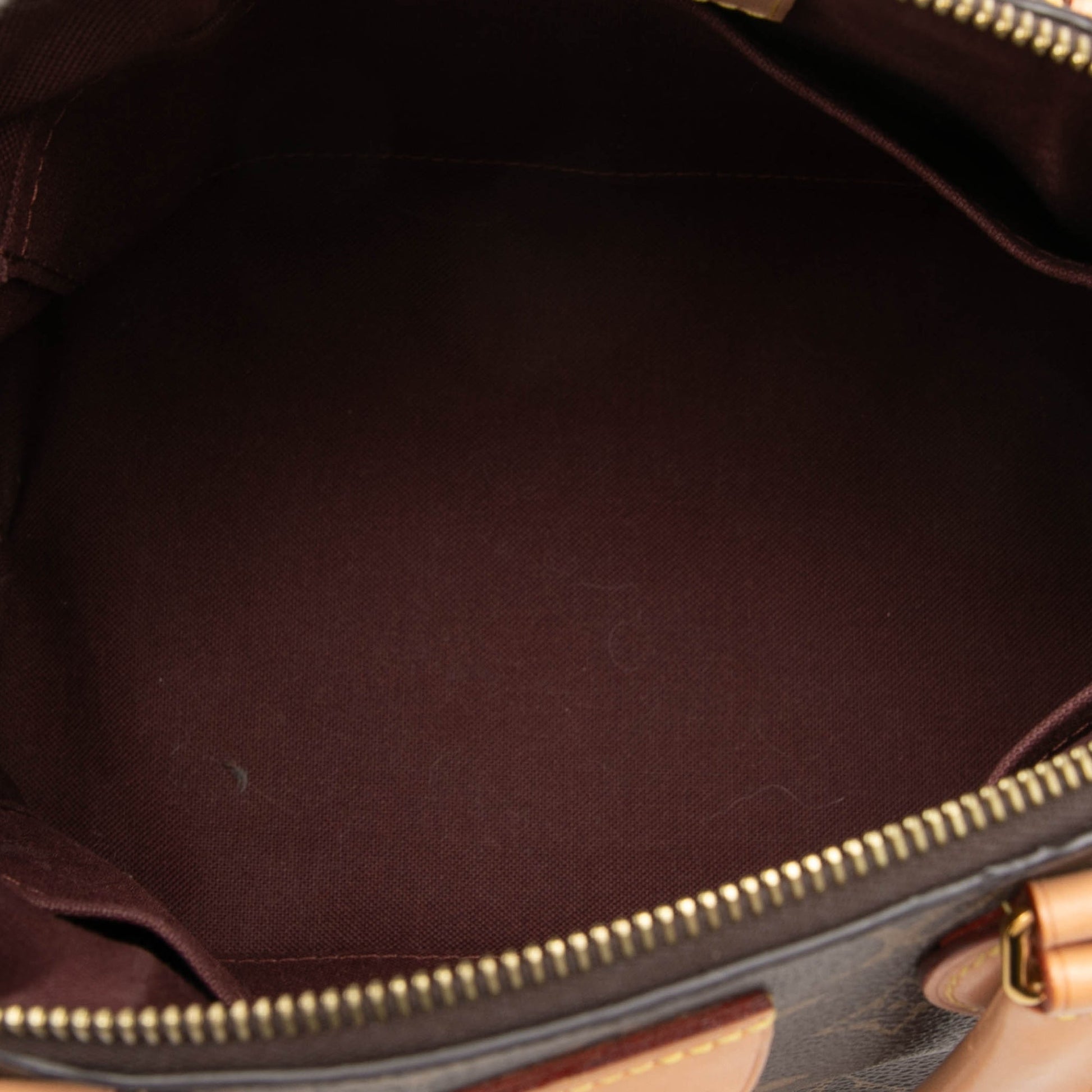 Louis Vuitton Monogram Rivoli PM