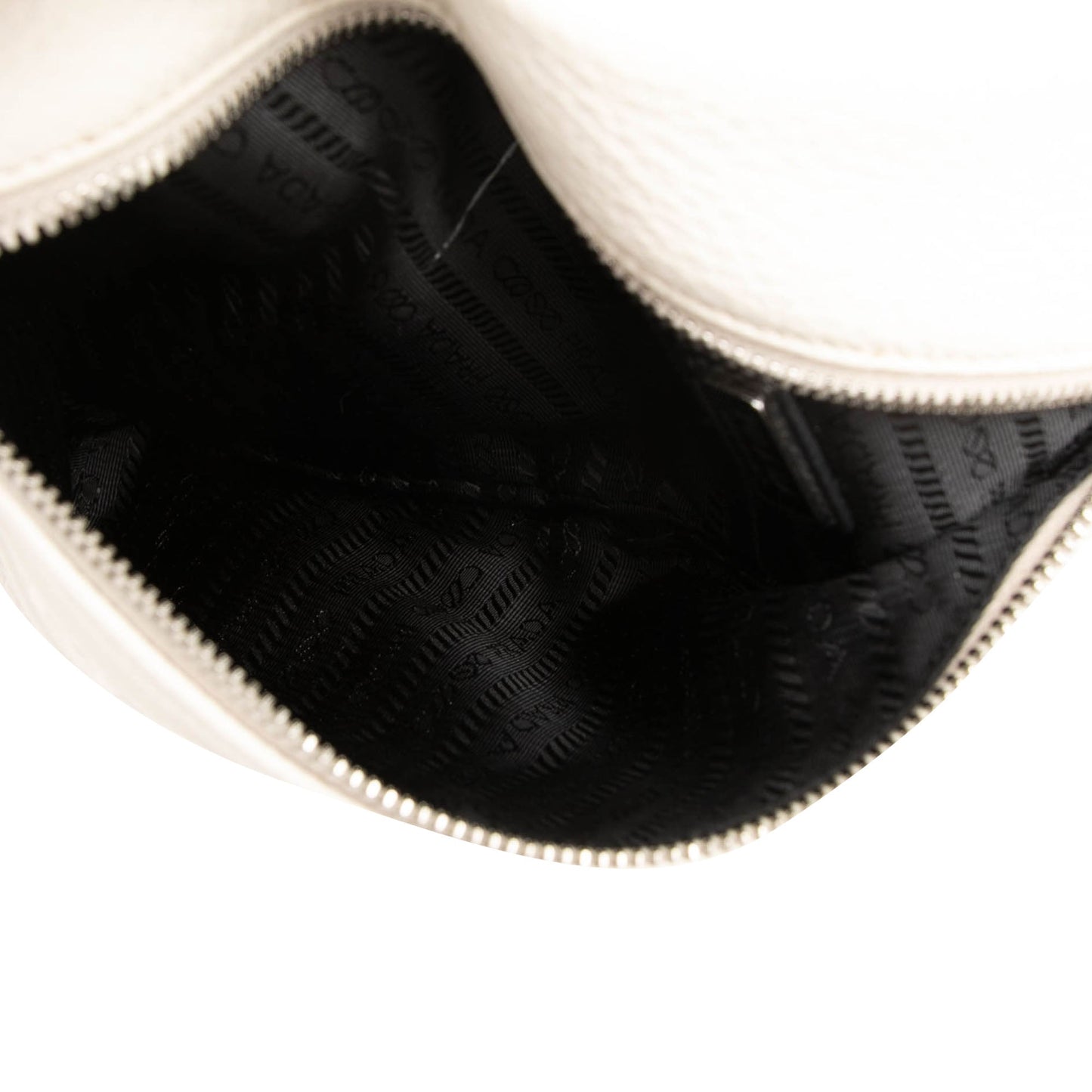 Prada Vitello Daino Logo Embossed Sling Bag