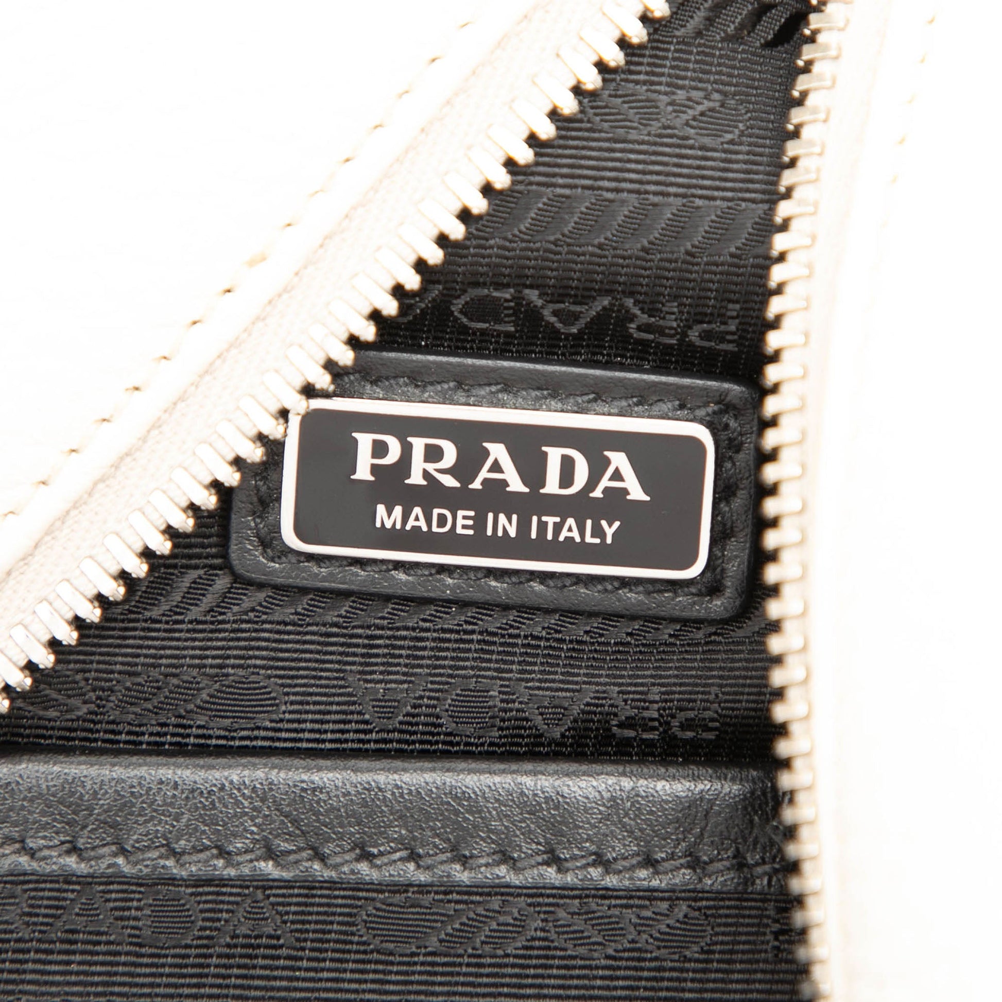 Prada Vitello Daino Logo Embossed Sling Bag