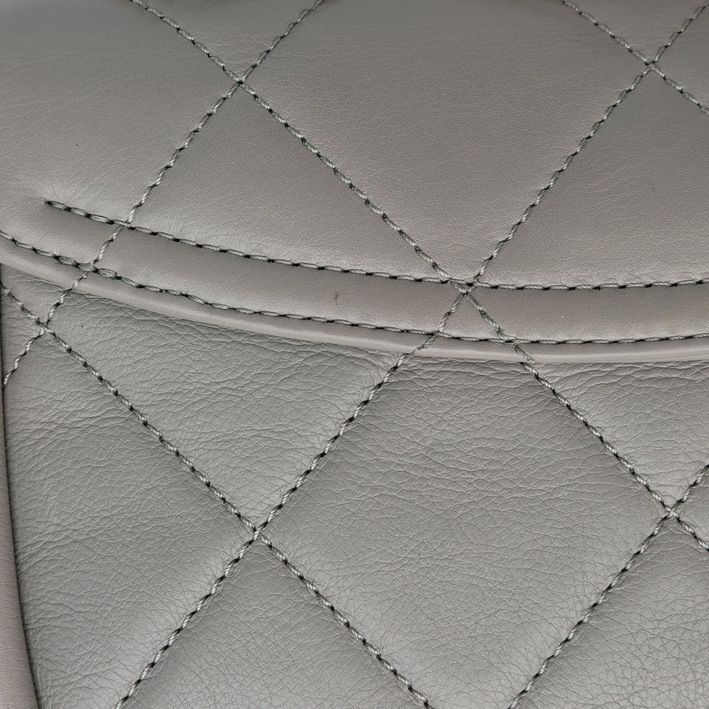 Chanel CC Quilted Lambskin Rounded Flap