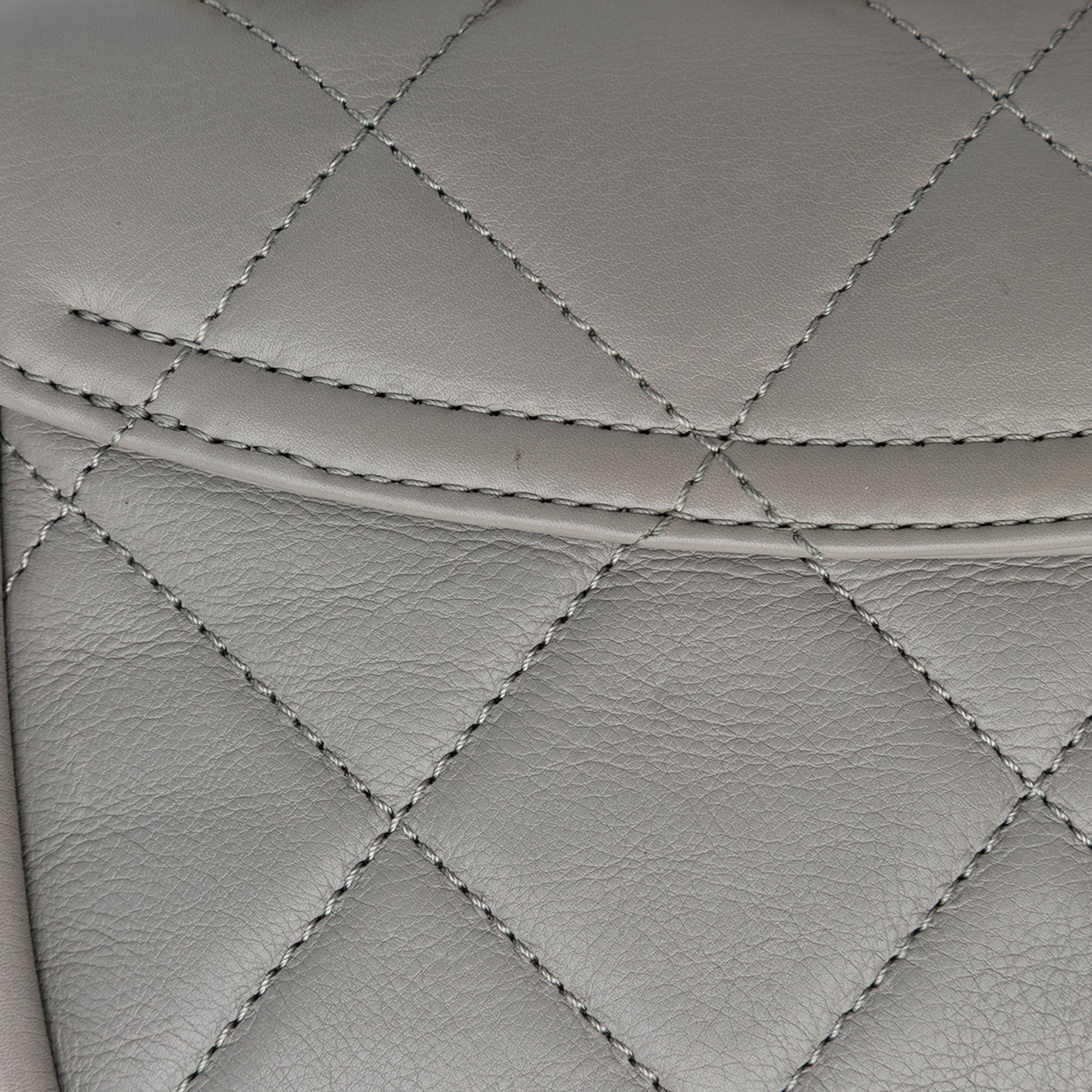 Chanel CC Quilted Lambskin Rounded Flap