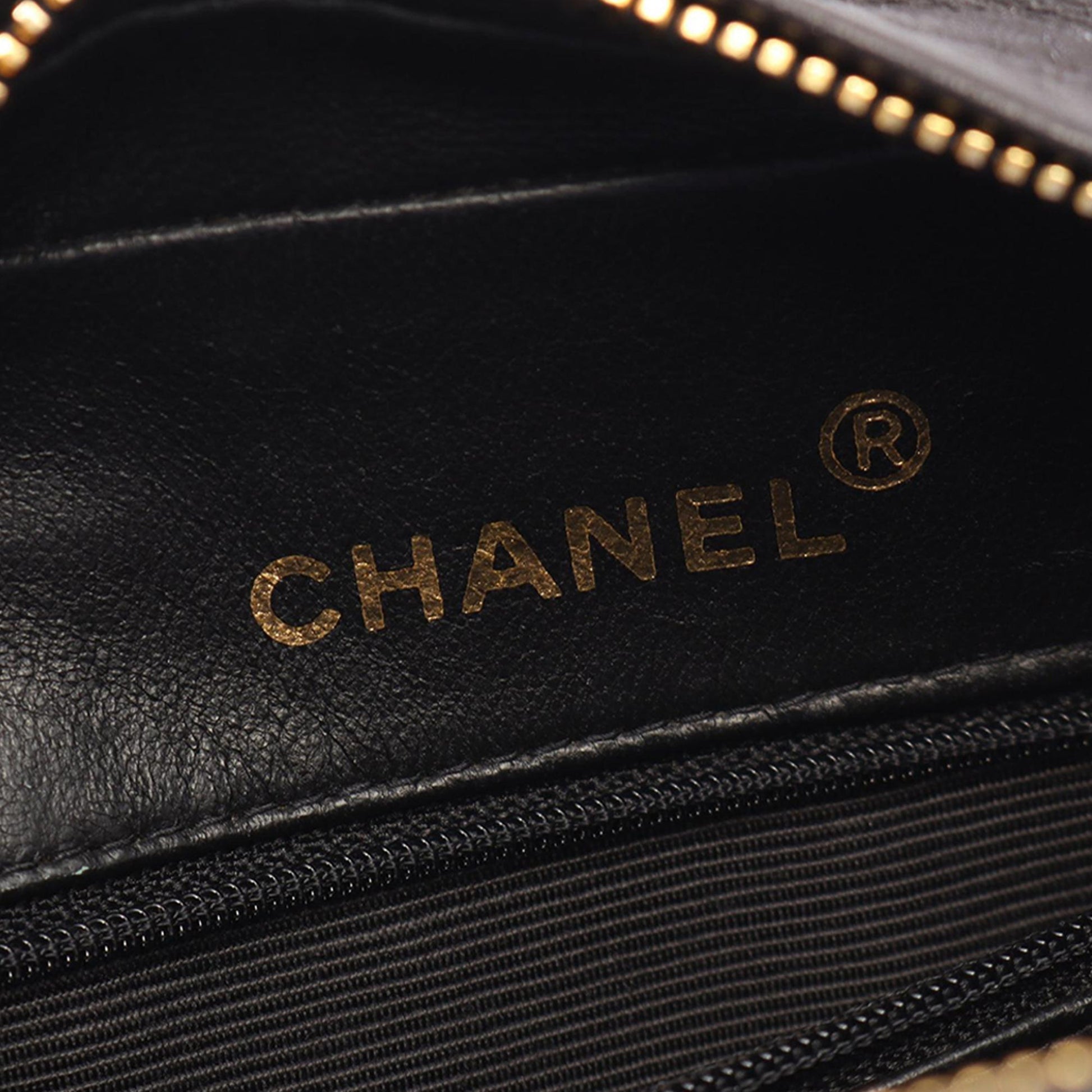 Chanel CC Vertical Quilted Lambskin Tassel Flap Camera Bag