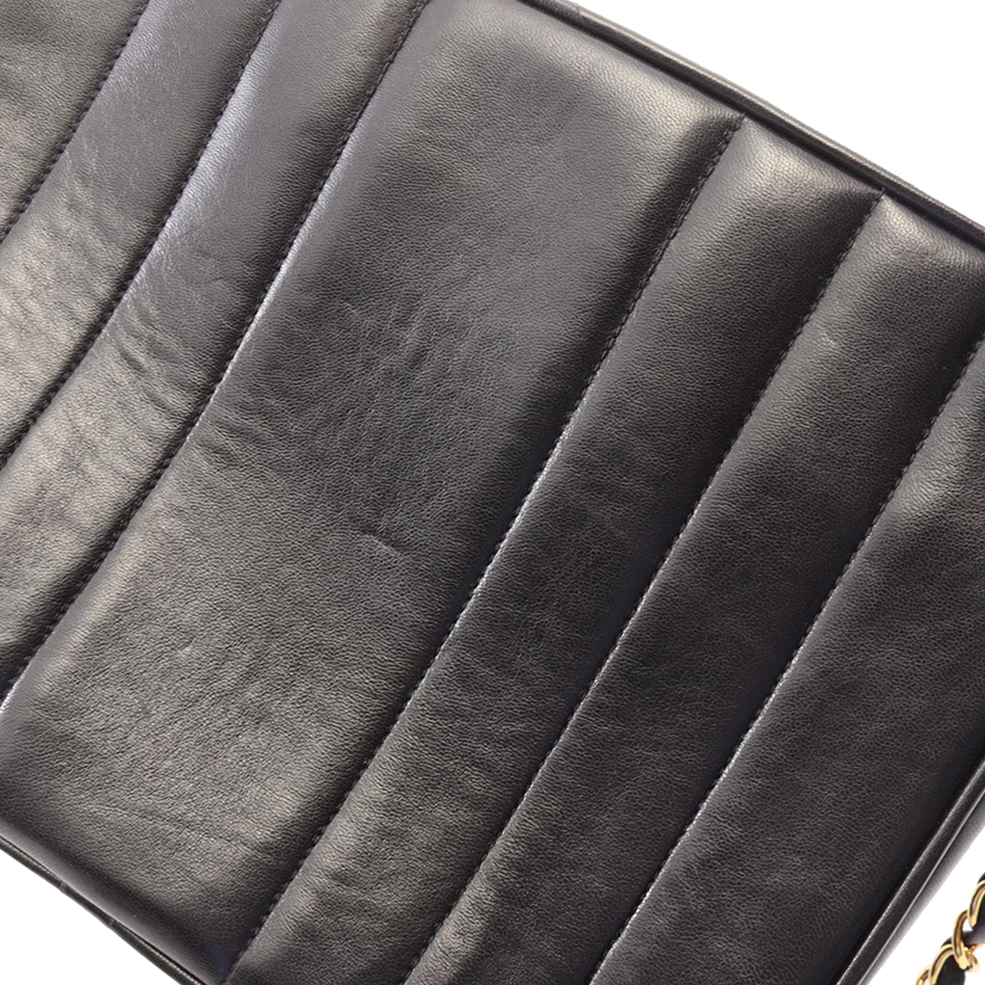Chanel CC Vertical Quilted Lambskin Tassel Flap Camera Bag