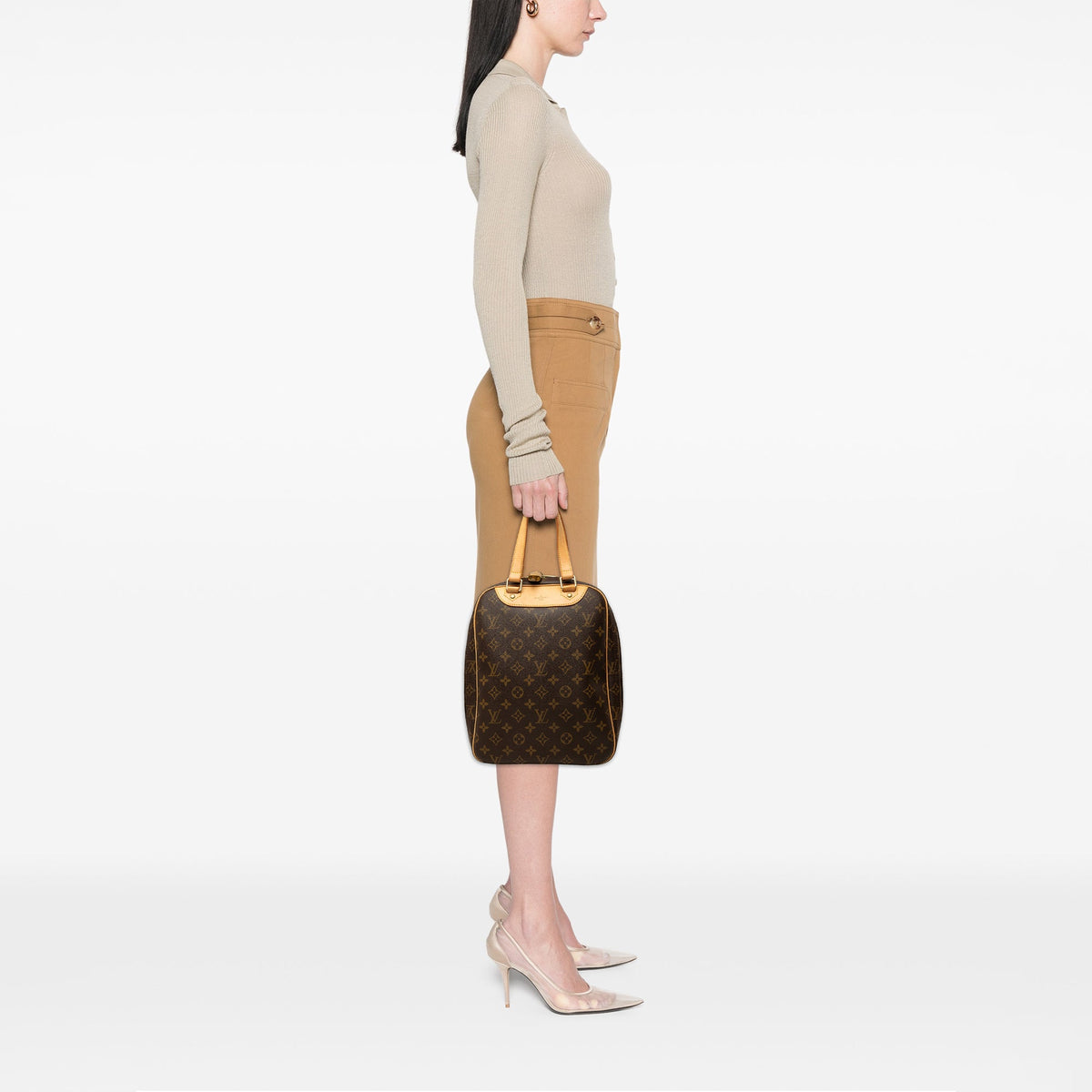 Louis Vuitton Monogram Excursion — Brown